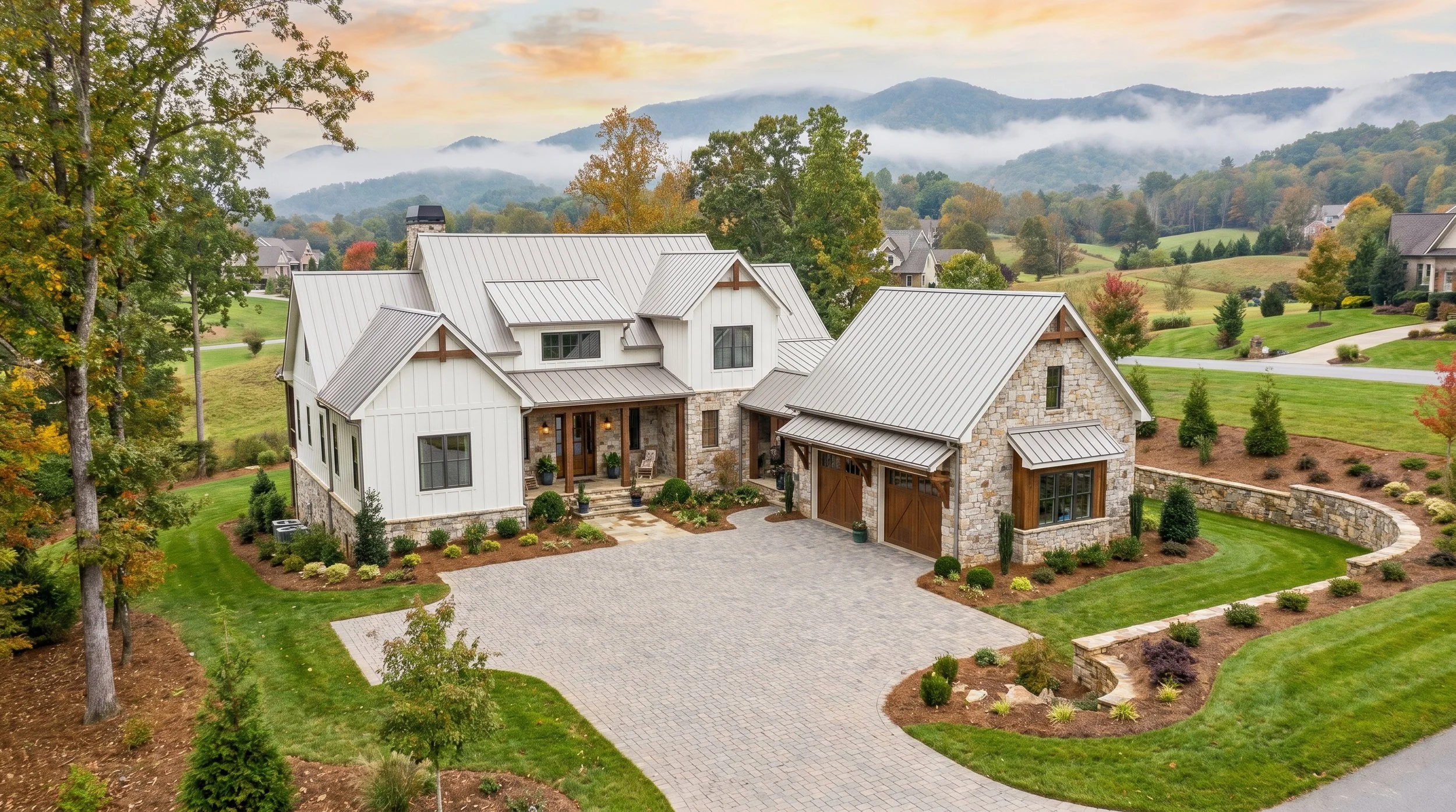 Rendering of a minimalist modern farmhouse with white board and batten siding, stone and gray metal roofing set in the Foothills region of North Carolina.