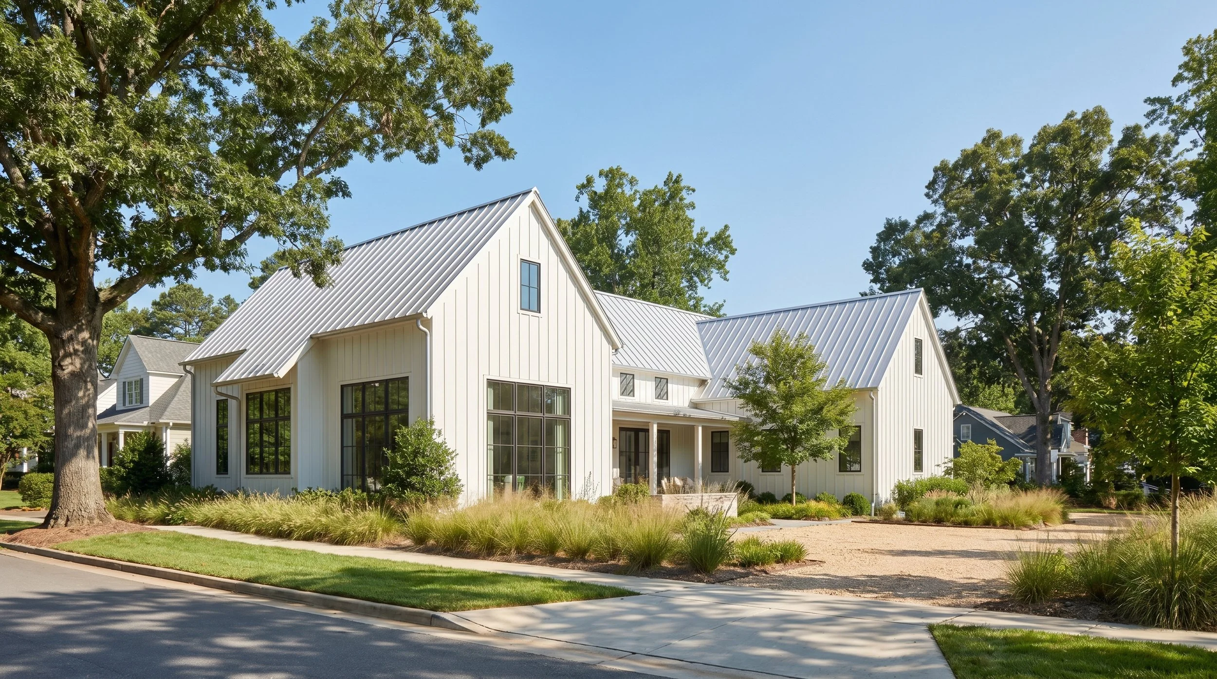 Rendering of a modern farmhouse with white board and batten siding, pea gravel driveway on a corner lot in Winston Salem, North Carolina.