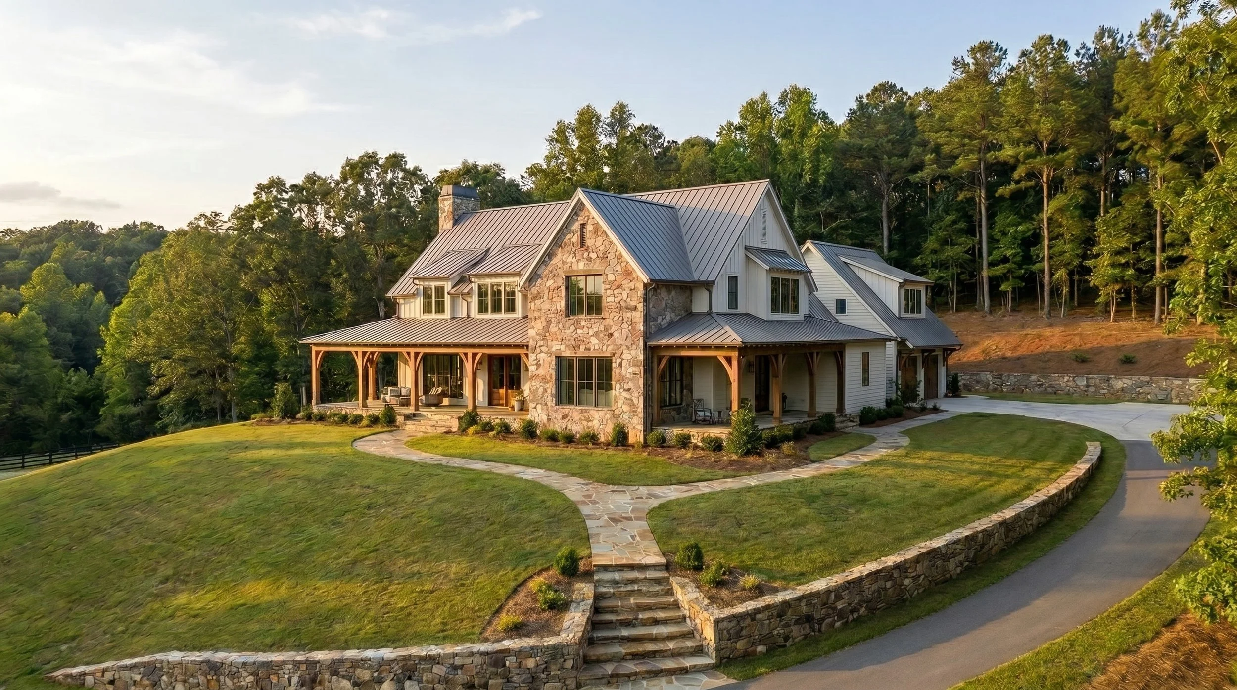 Rendering of the new American home with stone veneer accent, metal roofing, covered front and side porches. Available for custom design and build in North Carolina.