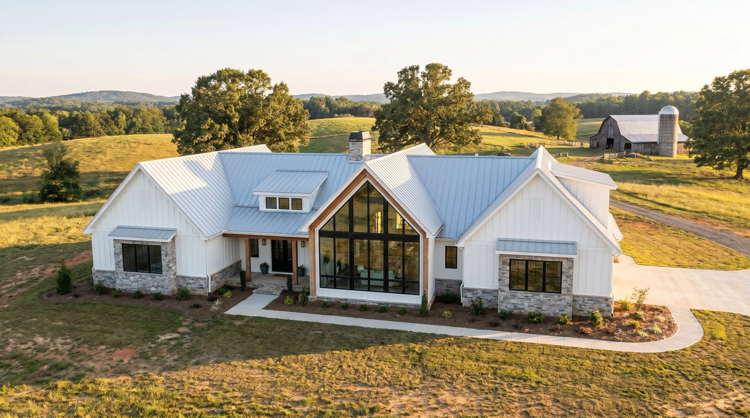 Rendering of a minimalist modern farmhouse with white board and batten siding and gray metal roofing set in the Piedmont Triad area of North Carolina.