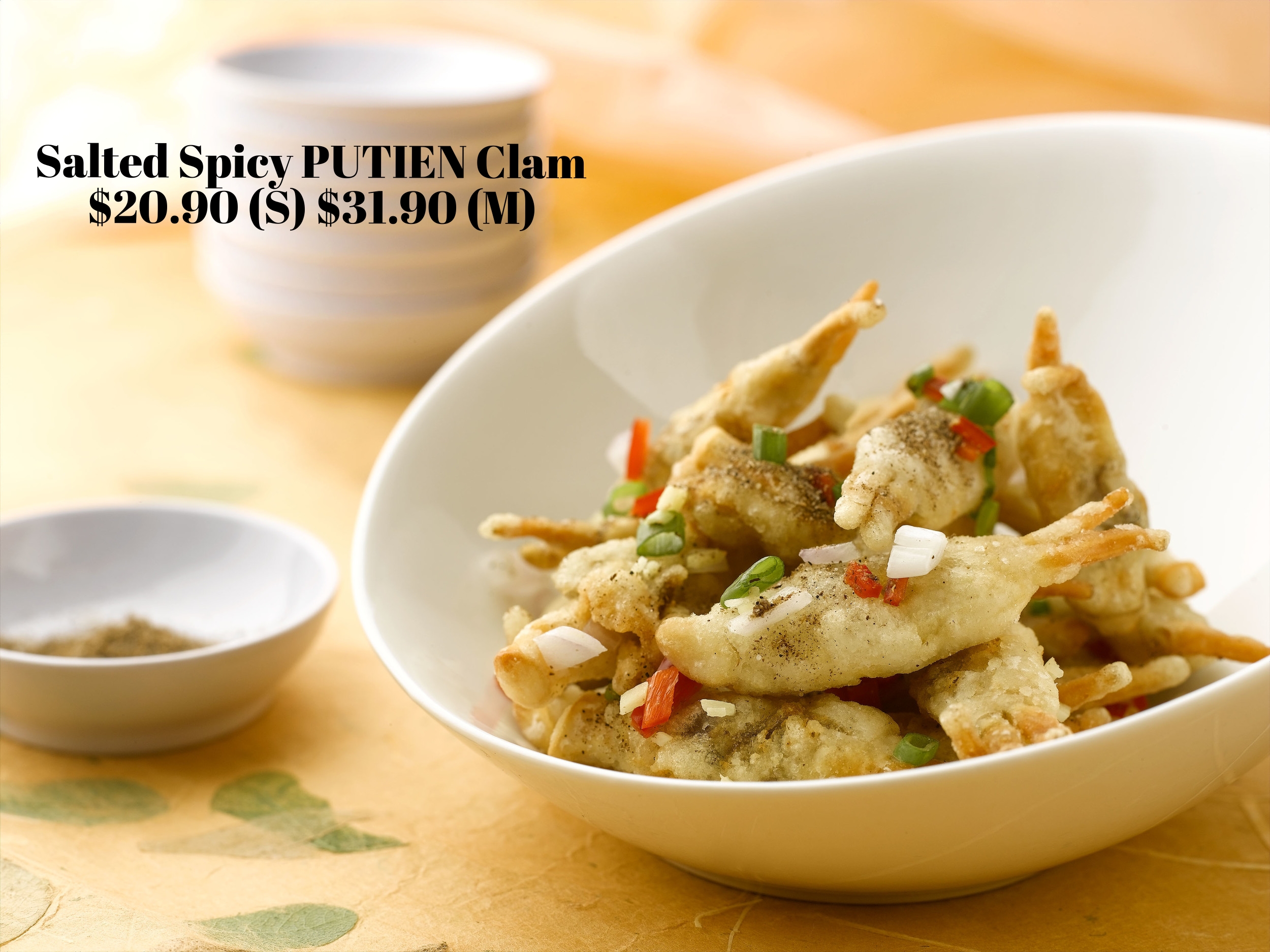 Crisp and lightly battered with spring onions and diced chillies, this is a dish perfect on its own or complemented with beer.