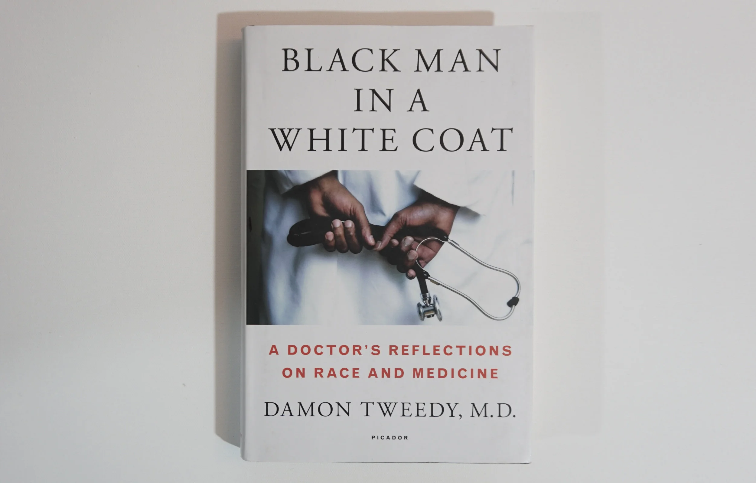 black man in a white coat.jpg
