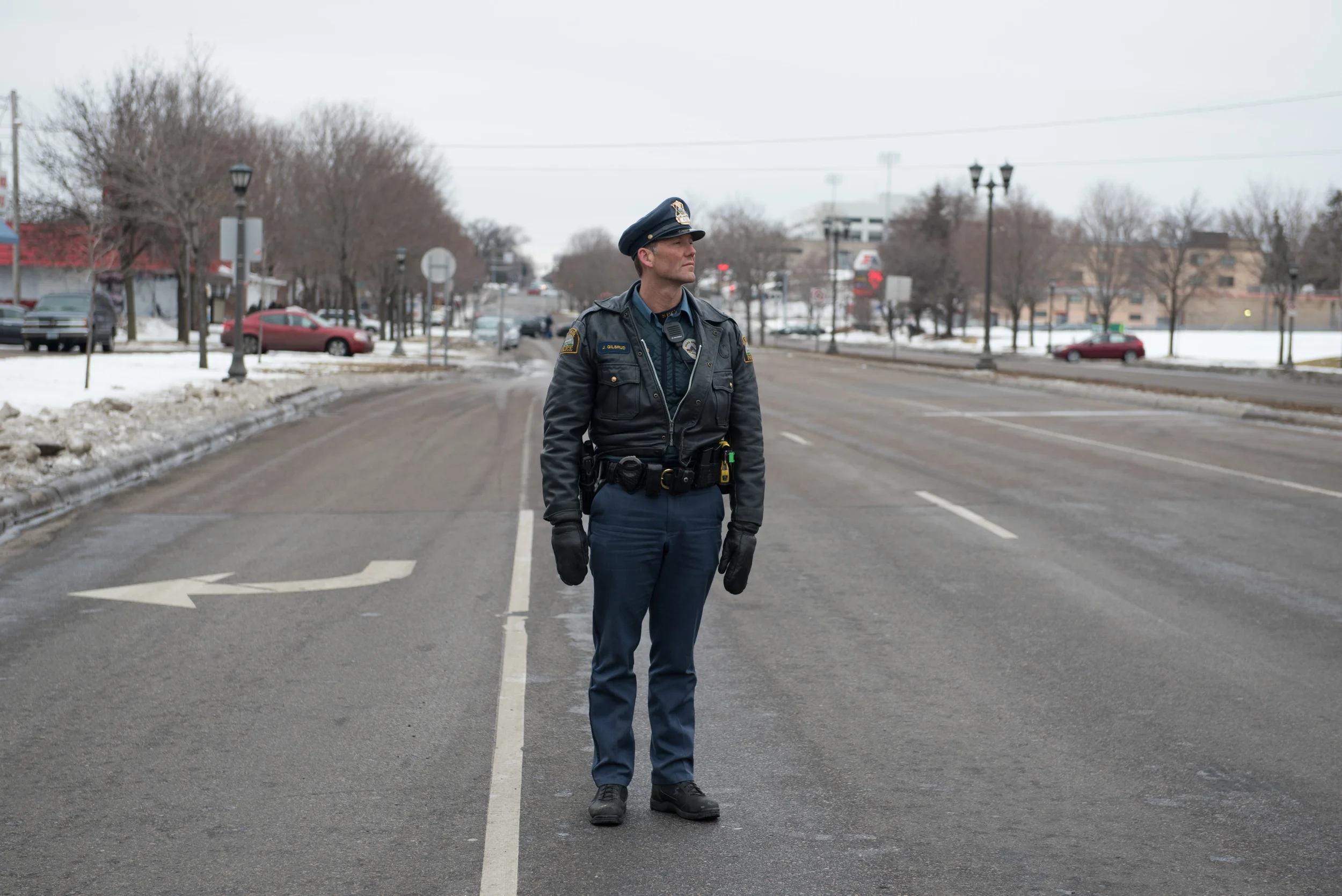 St. Paul police officer. #reclaimMLK march. January, 2015. For Minnesota Public Radio.