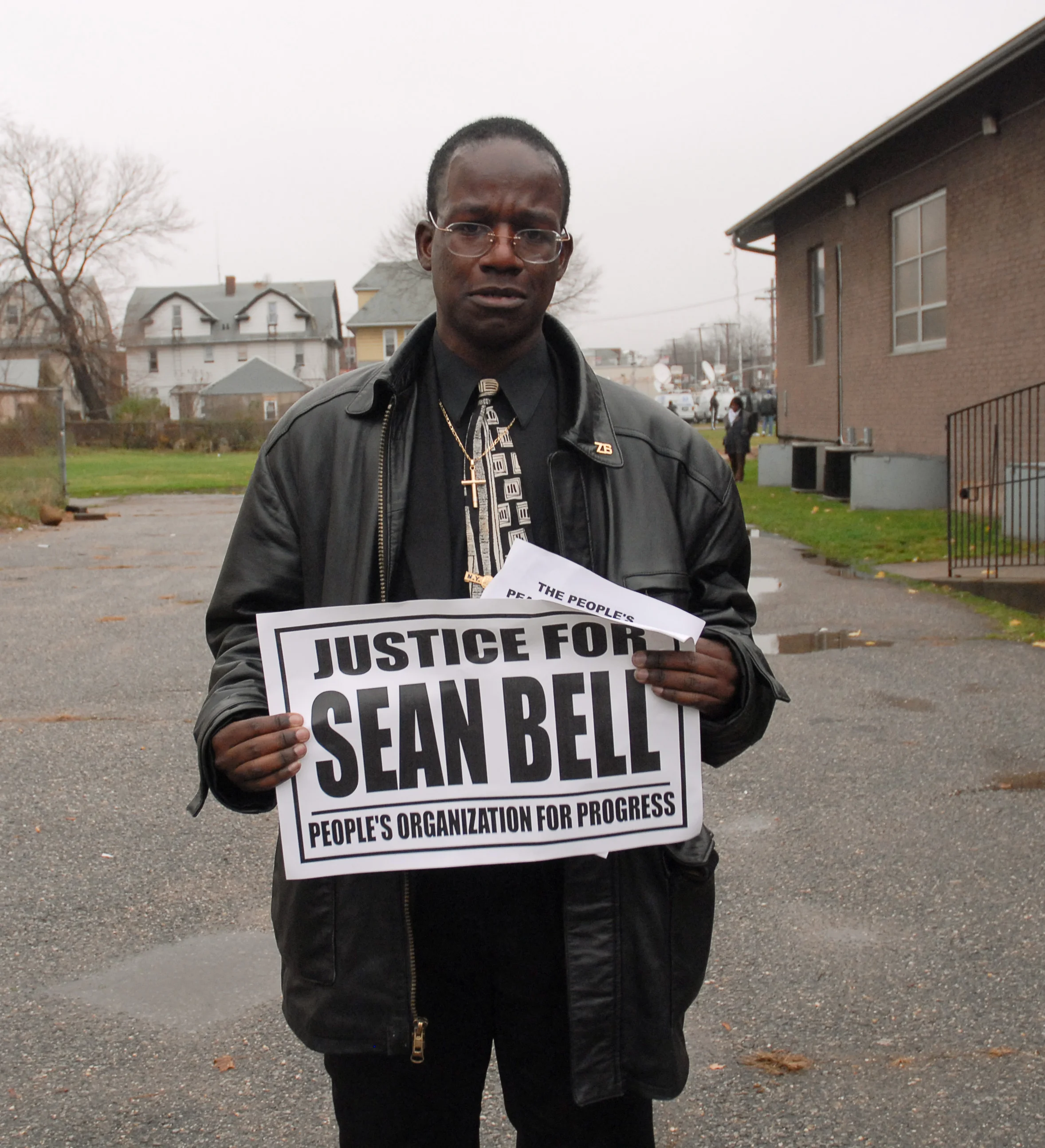 Mourner Stefan Johnson, 32. Outside the funeral of Sean Bell, killed by the NYPD. NYC, 2006. For The New York Times.