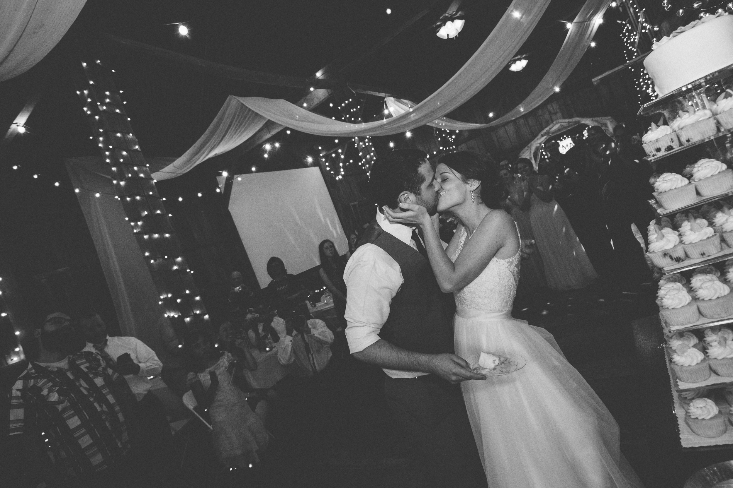 Cake cutting at Bliss Farm in Granville, Massachusetts. Sweet Alice Photography.