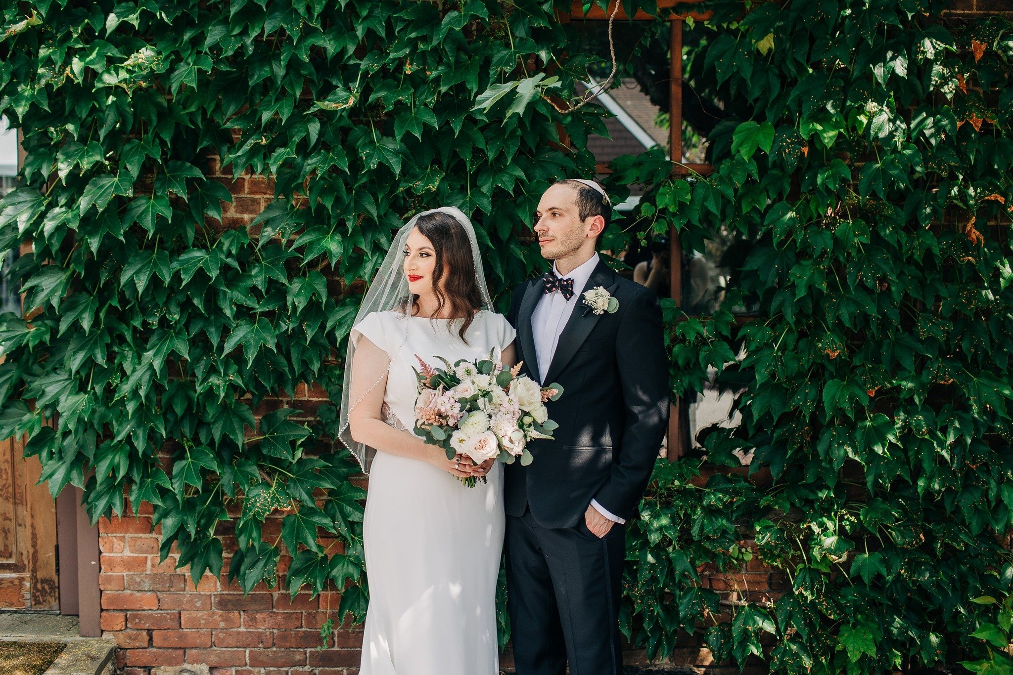 When Alina and I first connected, she told me that she was envisioning a slightly industrial garden and greenery vibe for her wedding day - and her wedding to Ilya at Brotherhood Winery in July delivered just that. It was a beautifully aesthetic day 