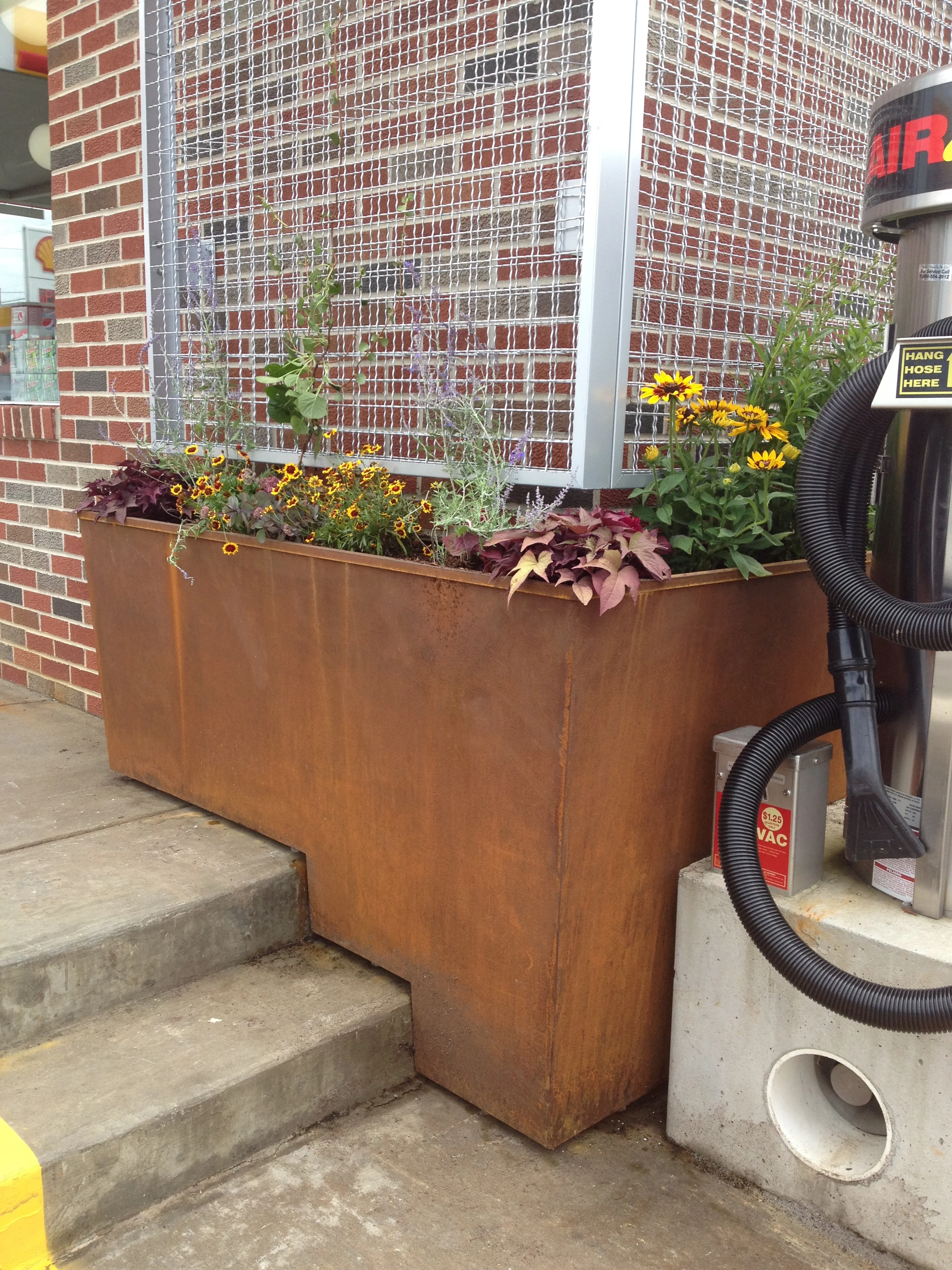 Stair climbing steel planters