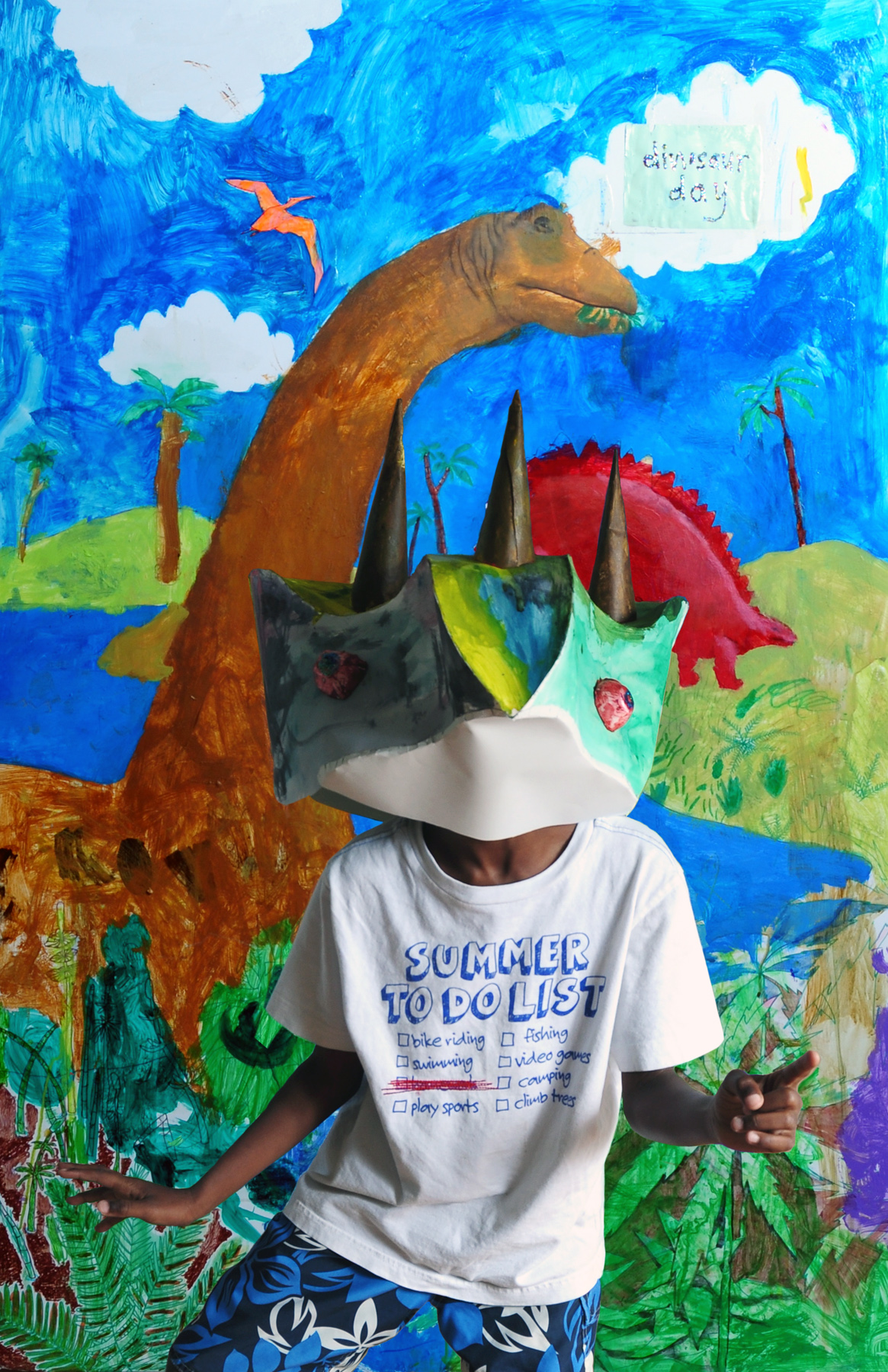 Student with the mask he made for a dinosaur unit&nbsp; 