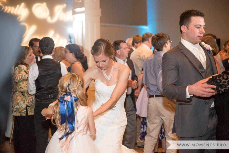 Bride Dancing with Flower Girl.jpg