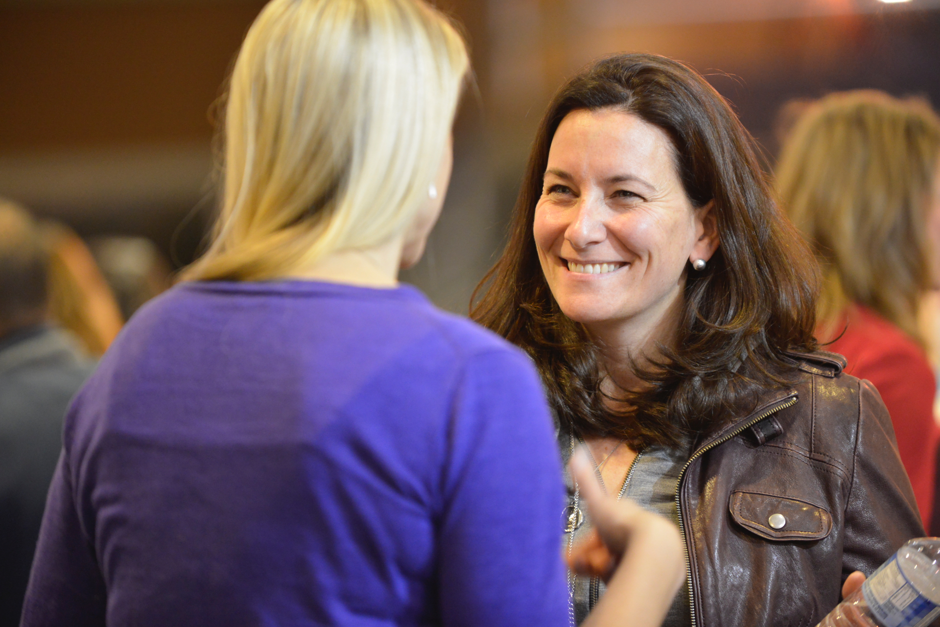 Shauna Casey, Startup Weekend facilitator from Seattle, (left) and Alice Reimer, CEO of Chaordix (right) discussing the pitches.