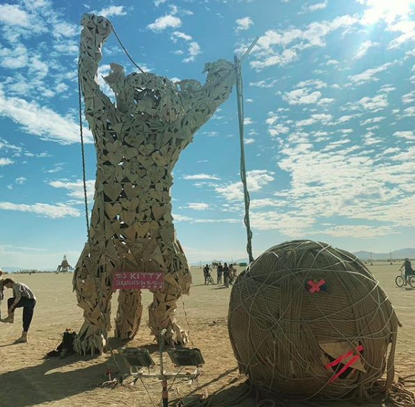 Giant kitty art made of hearts.