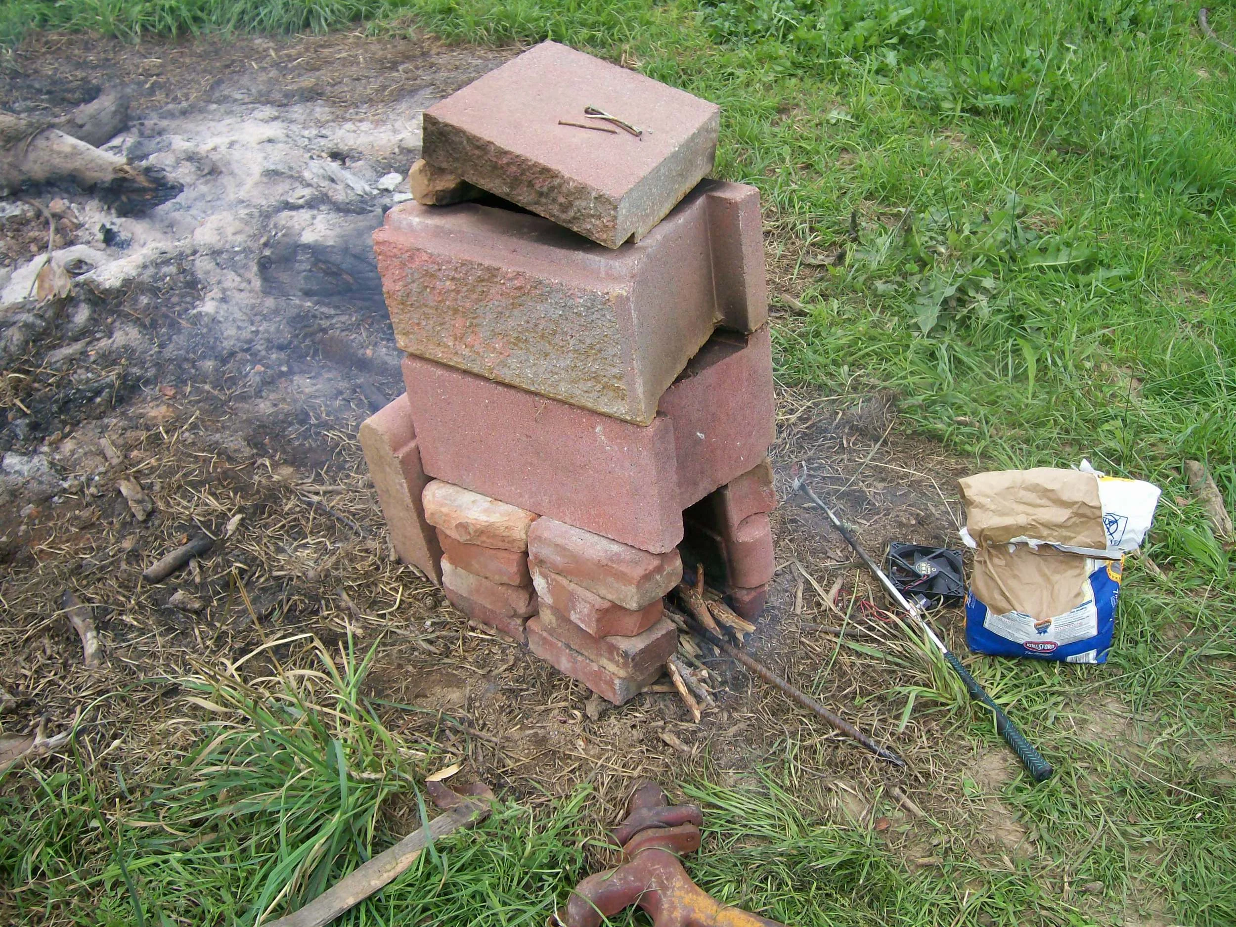 Backyard forge iteration 2, featuring coal and rebar.