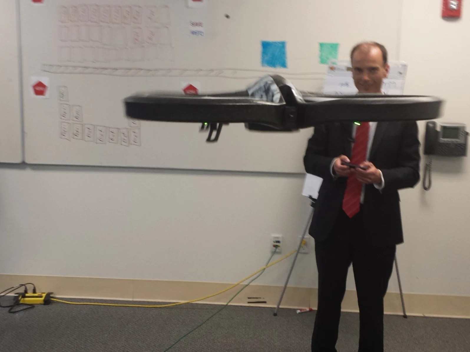 Early testing with WiFi-controllable drones to create real time inventory visibility for retail. Note fiducials in background.