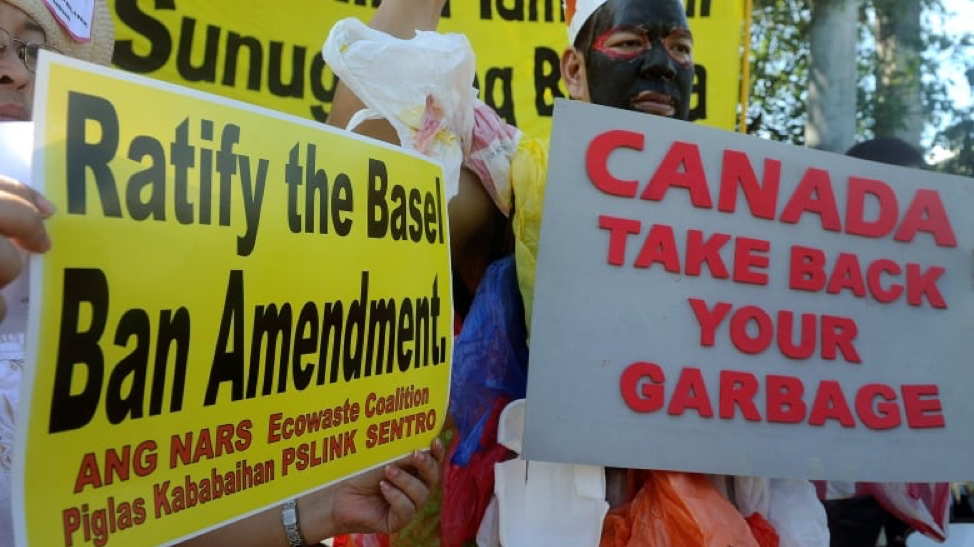 Environmental activists rally outside the Philippine Senate in Manila on September 9, 2015 to demand that scores of containers filled with household rubbish be shipped back to Canada and to push for the ratification of the Basel Ban Amendment which prohibits the export of hazardous waste from developed to developing countries. (AFP/Getty Images)
