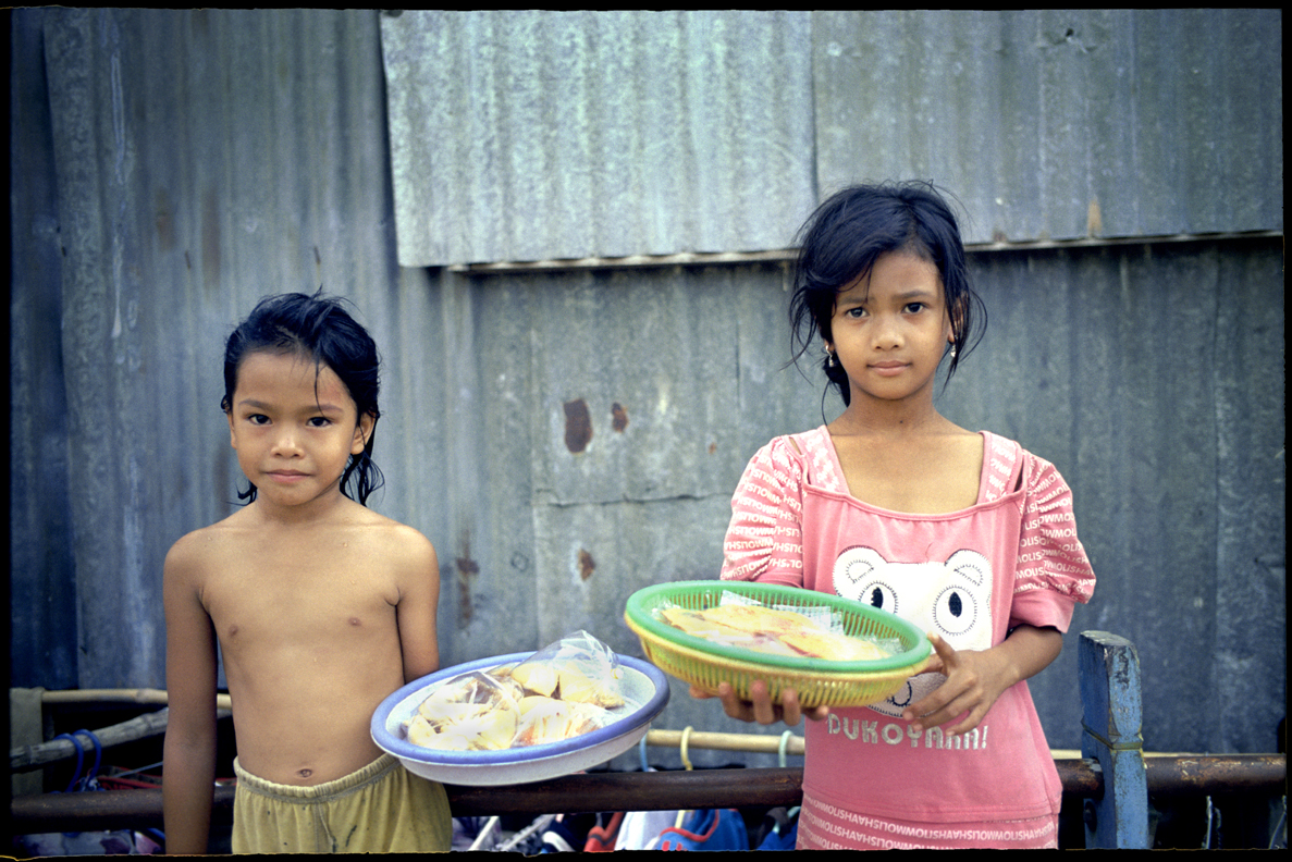 Local kids selling trinkets, Mekong Delta.