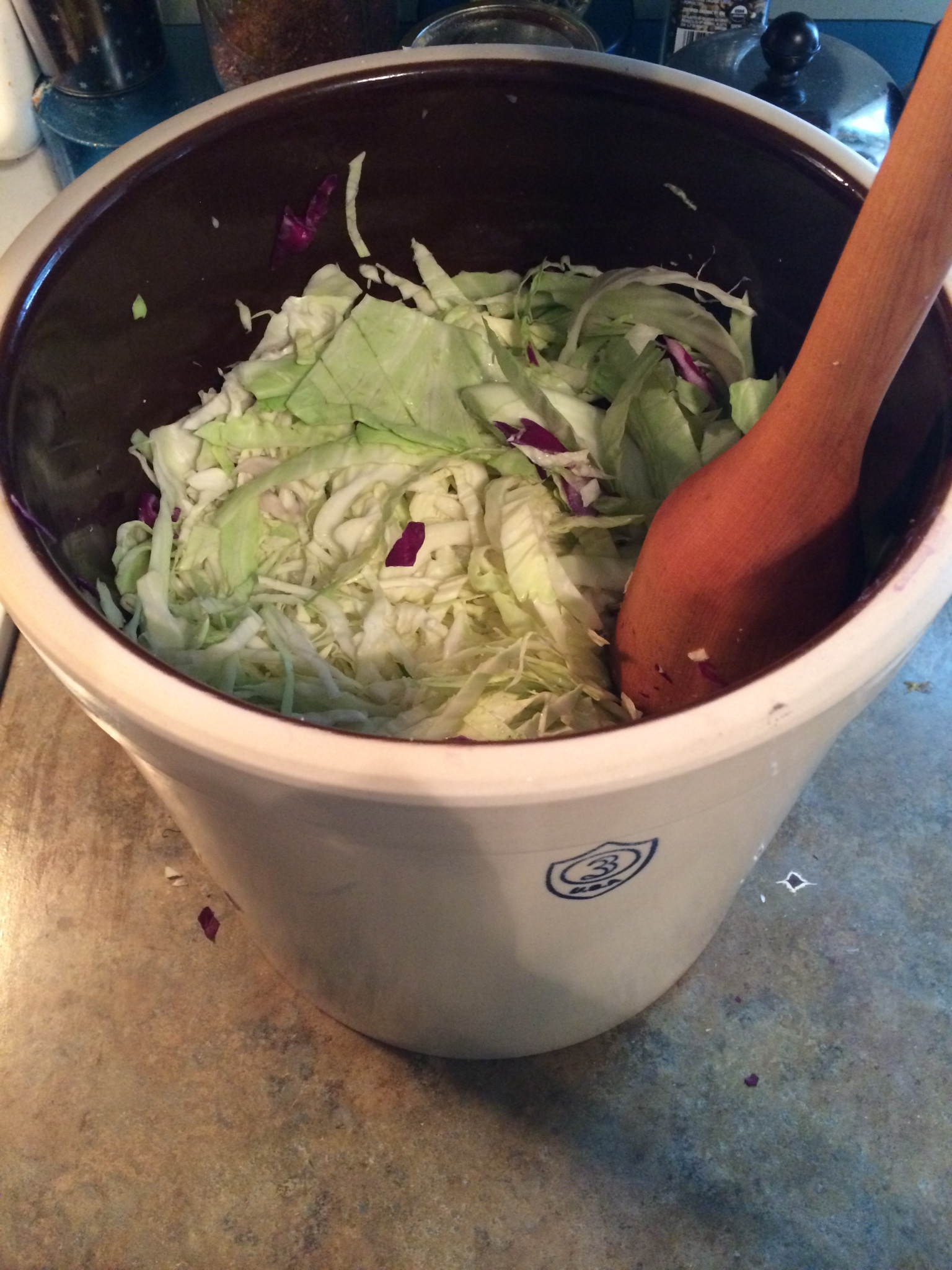 Learning to make sauerkraut.