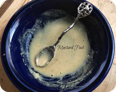 Ground mustard seed with water.