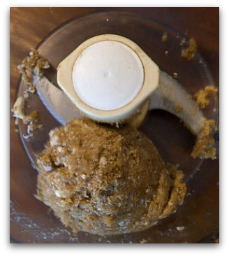 Crispy nuts, coconut, and dates processed until the whole mixture comes together.