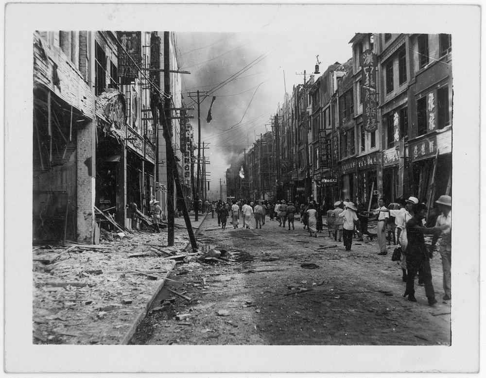  A street scene in Chongqing following a Japanese air raid, 1940.  					  					  					  					 