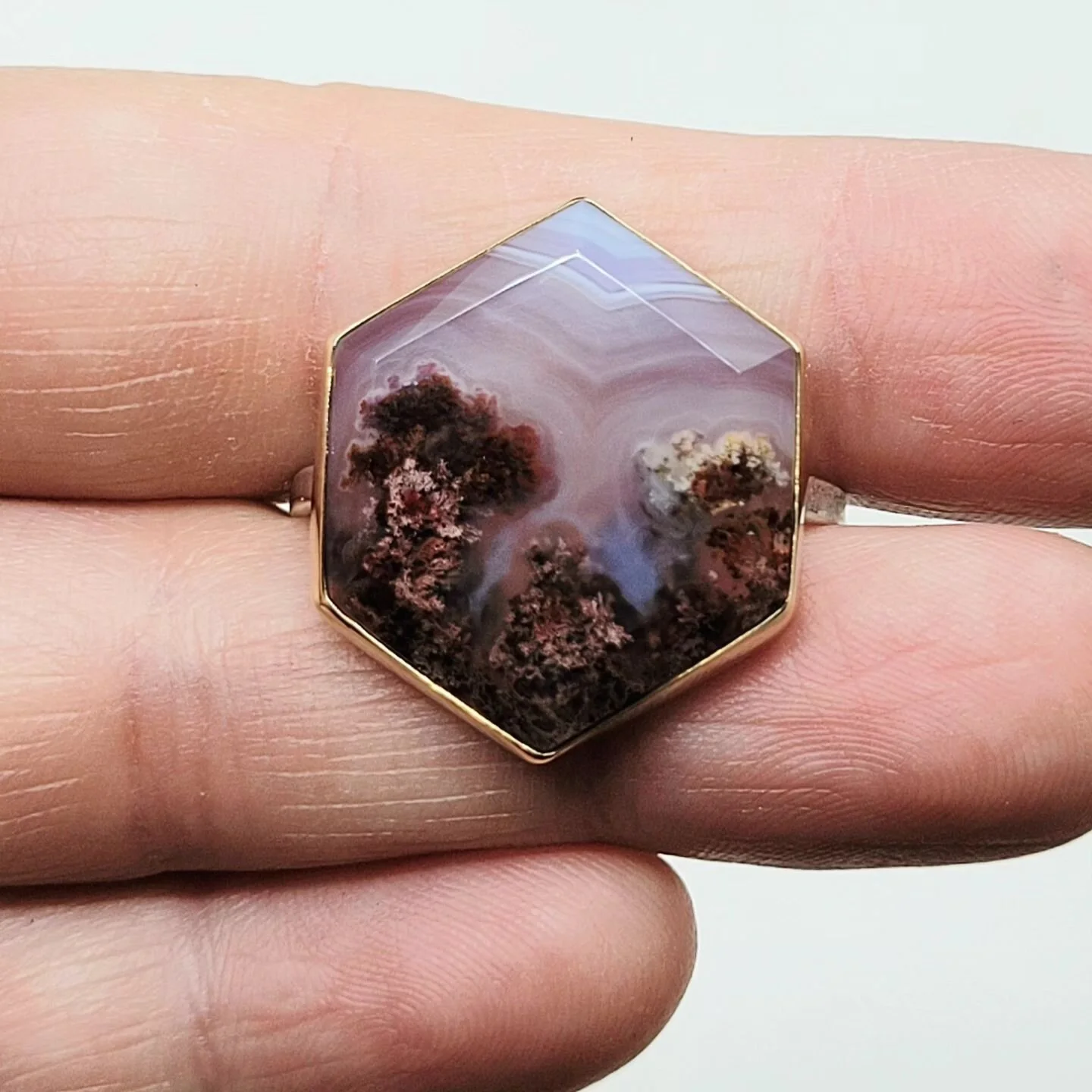 Agates are one of the most amazing stones out there- just look at this small world set in a bezel! It reminds me of red sea coral underneath the ocean waves. This moss agate ring found a new home and is off to inspire wonder.

Would you be interested