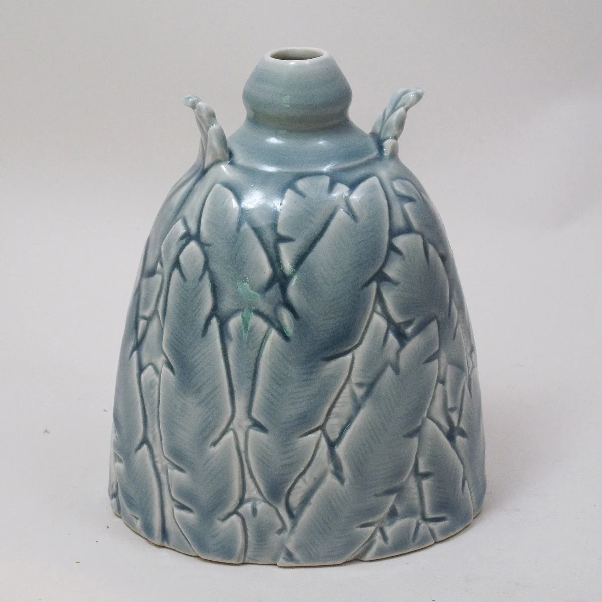 David-Voorhees-feather-carved-porcelain-bottle.jpg