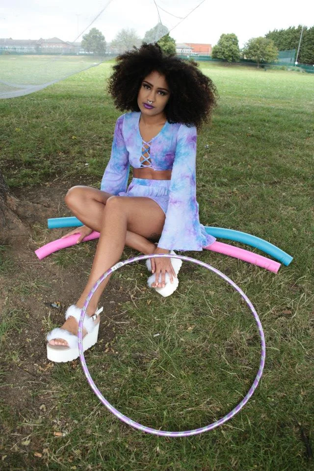 loren purple sitting under tree.jpg