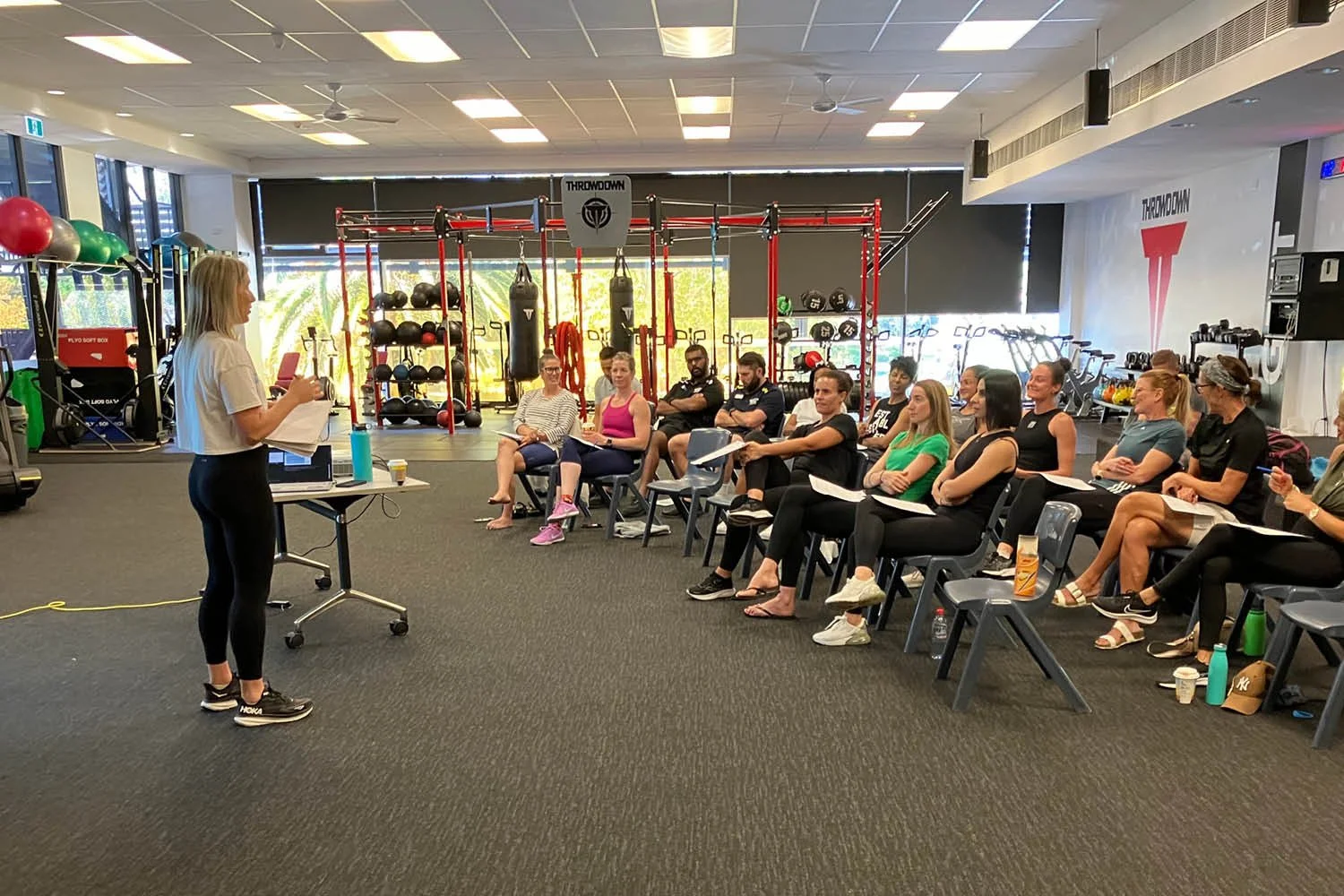 Women’s health & fitness educator, Brooke Turner speaking at an event