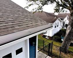 An official Gutter Helmet reverse-curve surface tension gutter cover installation.