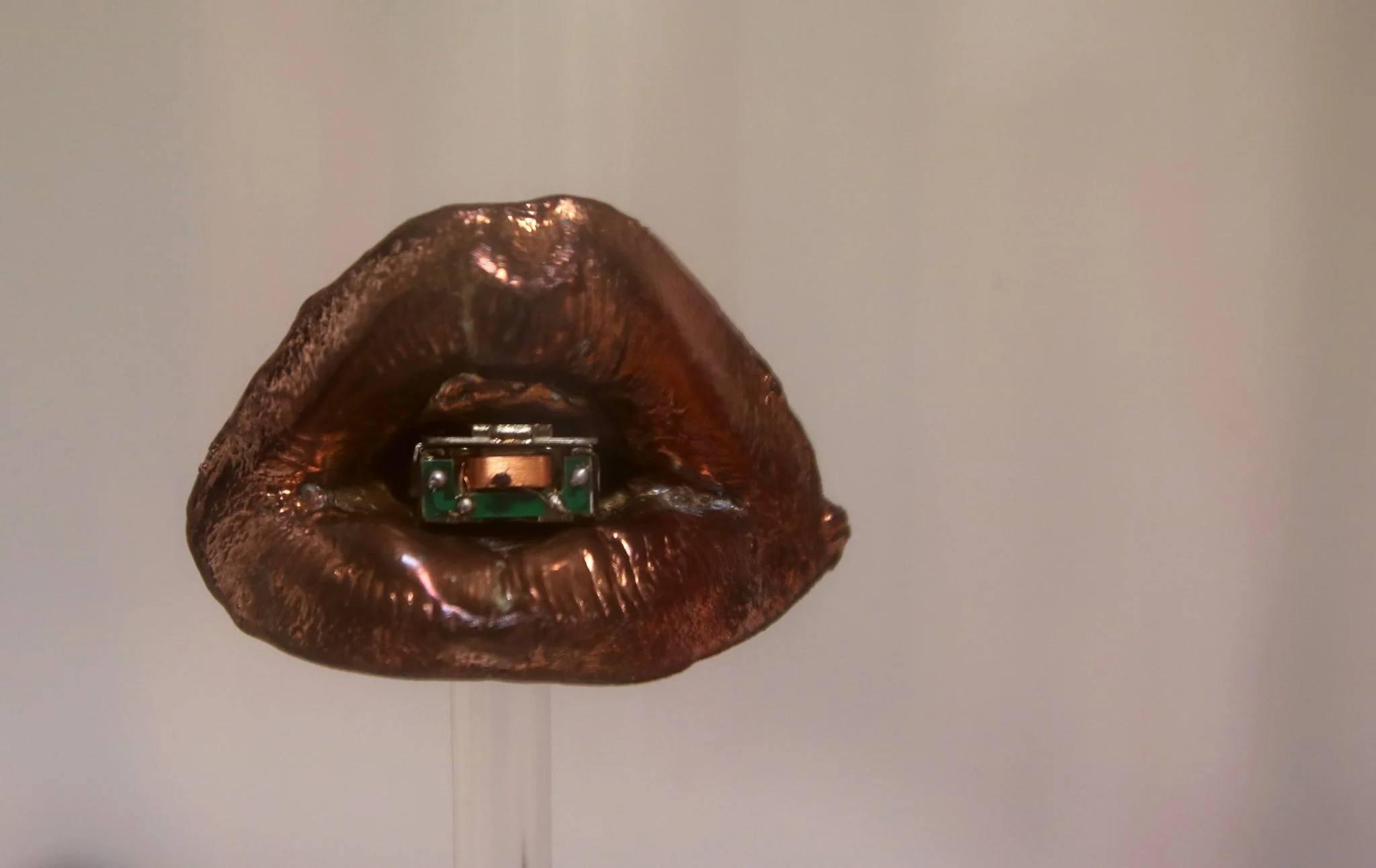Bone-conductive music jewelry device designed by Nuala Clooney