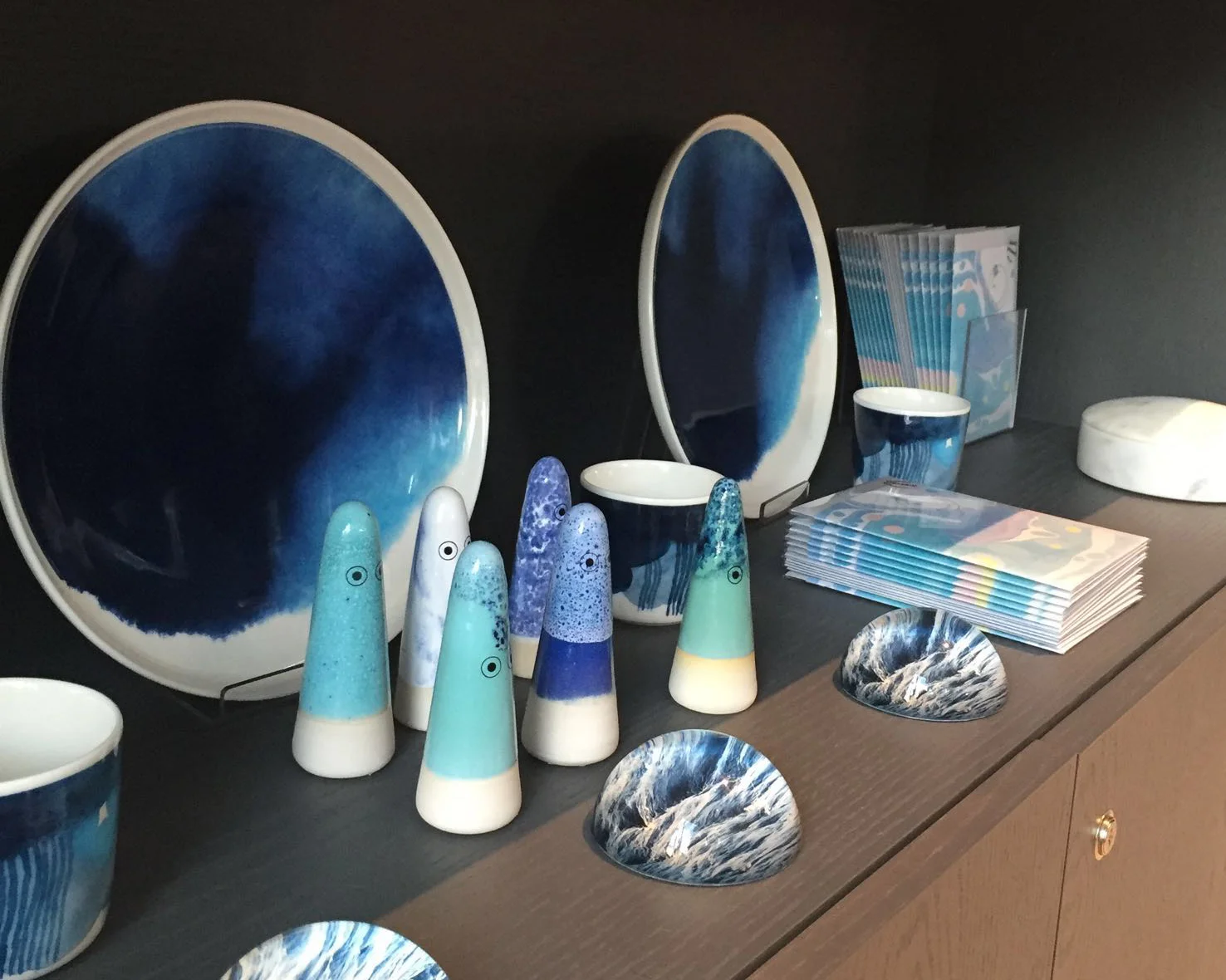 And finally this is the blue corner. We loved the combination of the different textures and patterns on these objects – the inky plates, the paint splattered ceramics and the marbled greetings cards (by us!) 