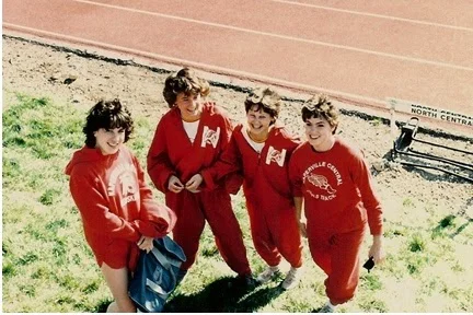 Amy with her 4x800 team in High School (we are NOT going to tell you the year).