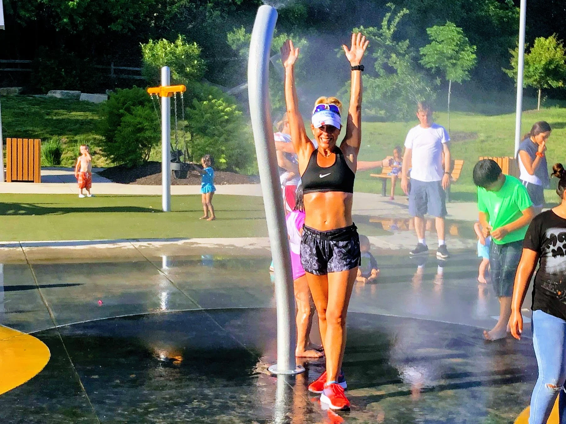 Coach Amy Practicing Topical Cooling During a Hot Run