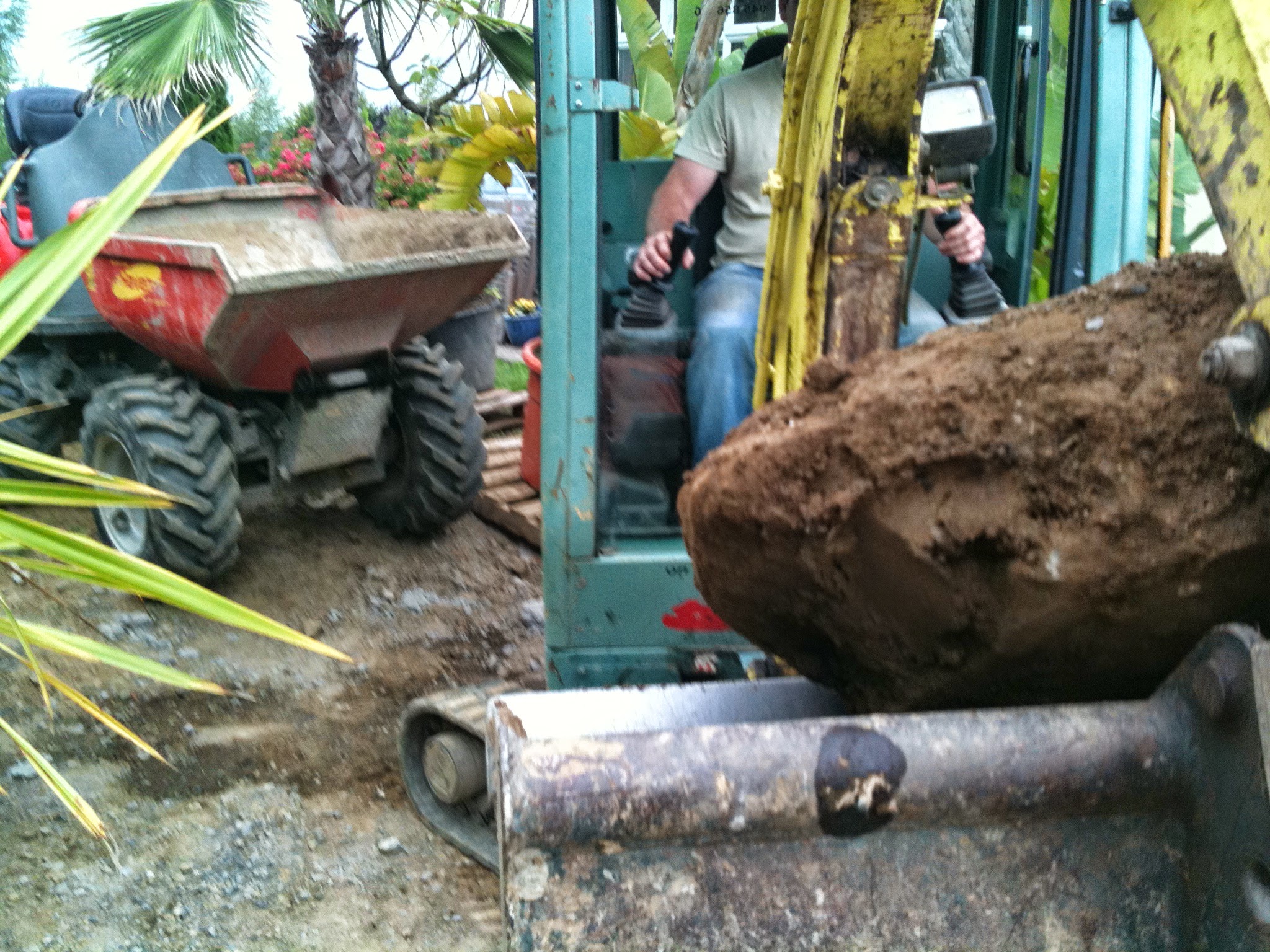 moving boulder landscaping.JPG