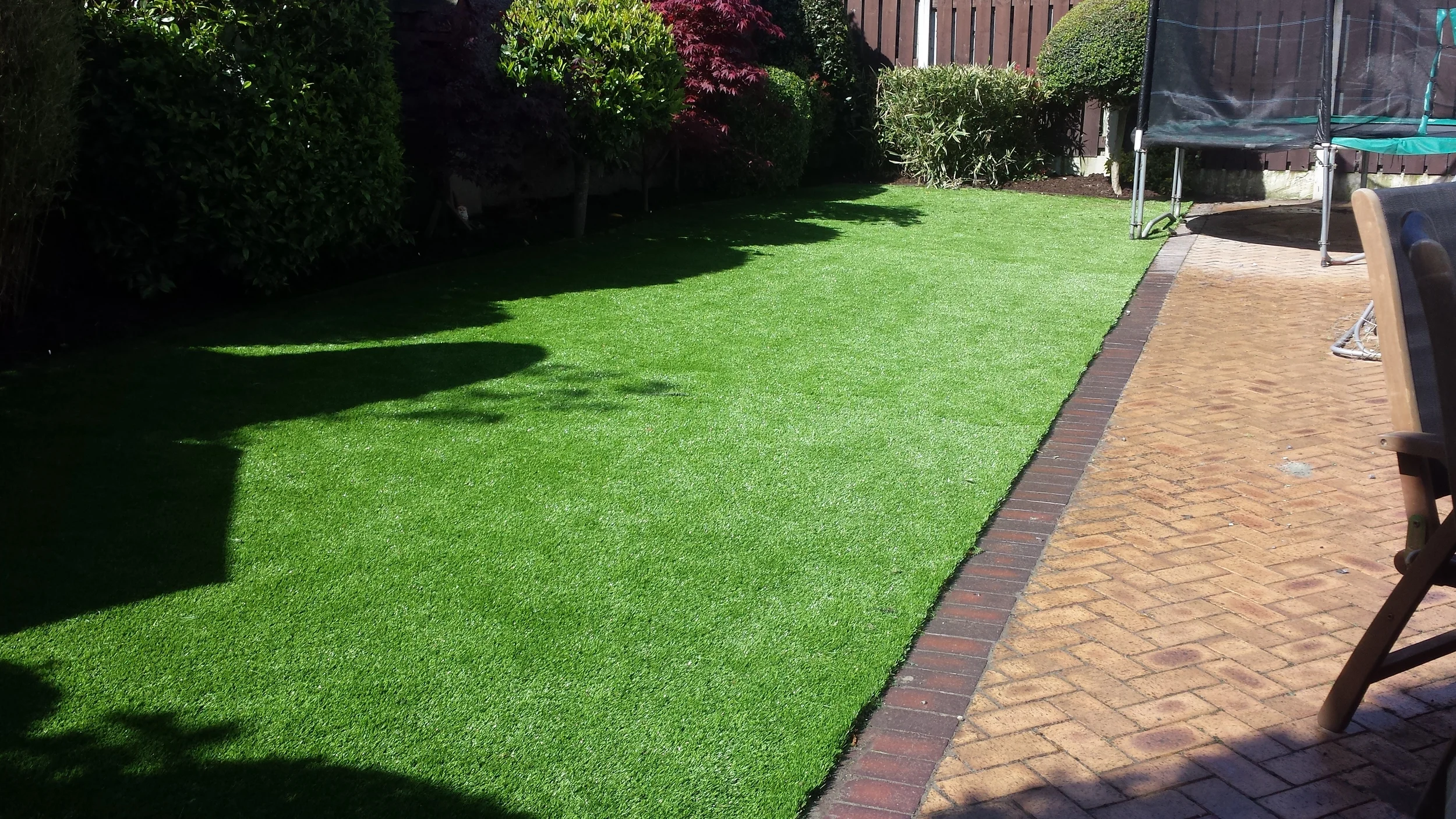 artificial grass in family back garden