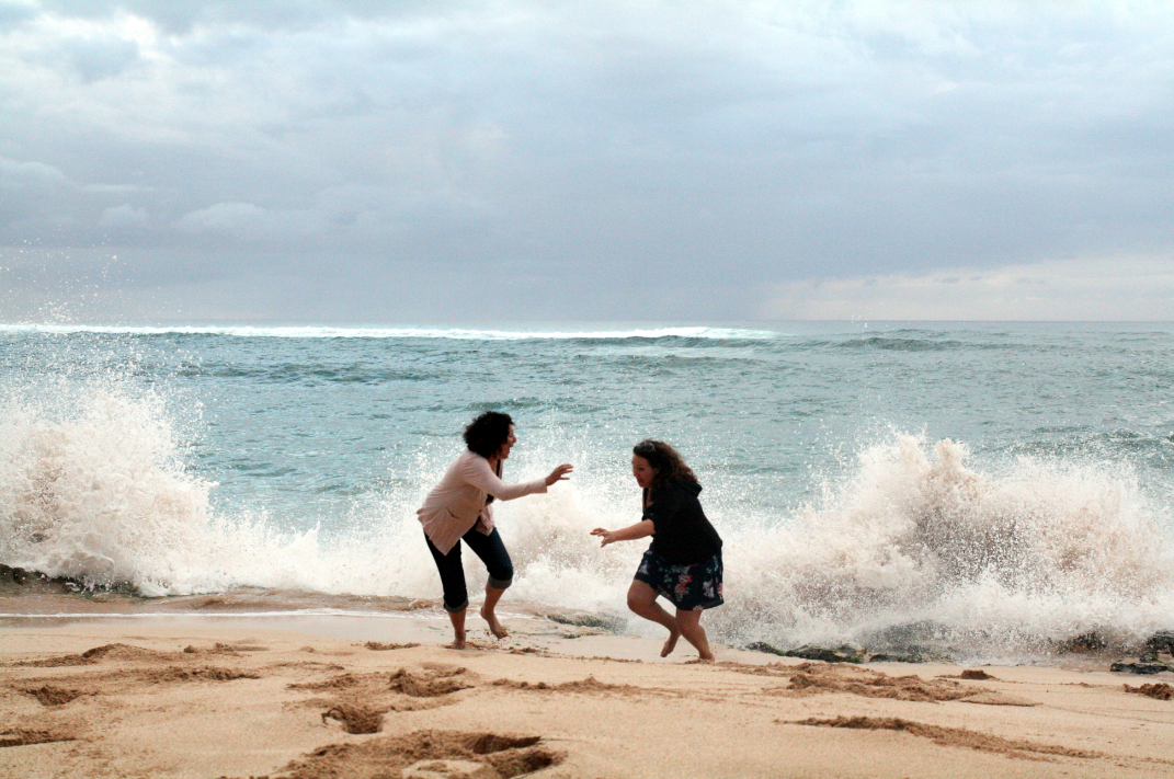 lacy and leigh chased by waves