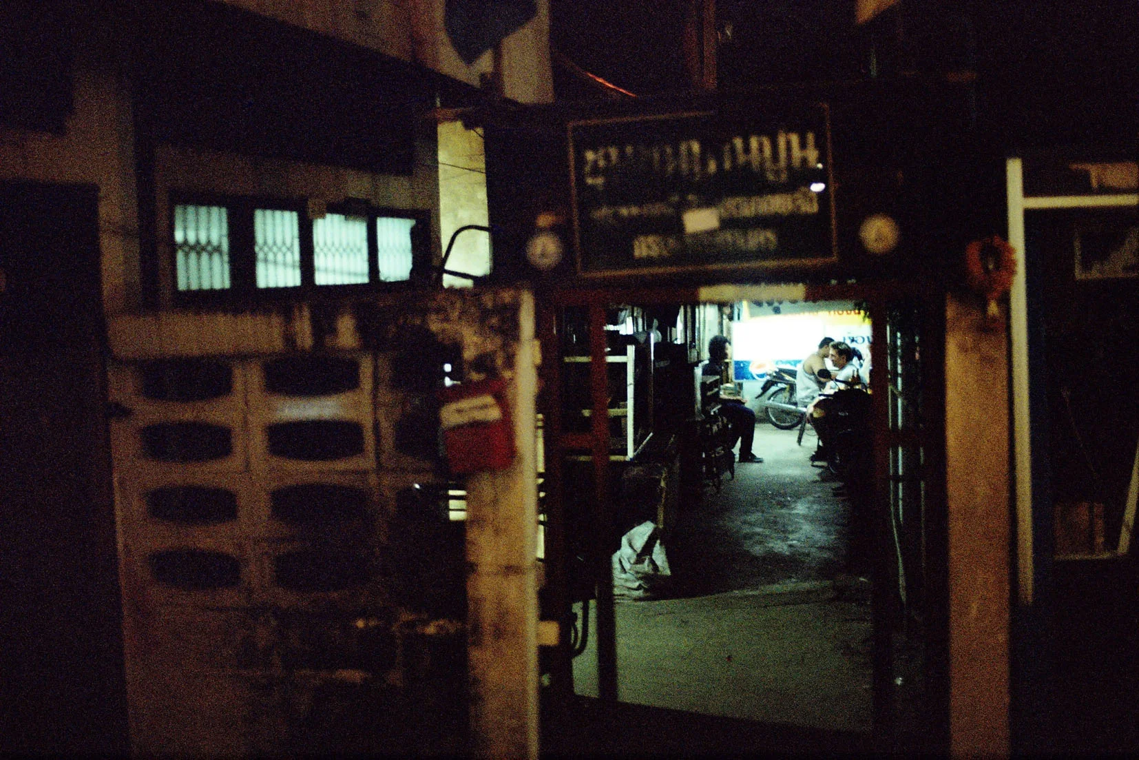 Shot on a Minolta X-300. Bangkok, 2012.