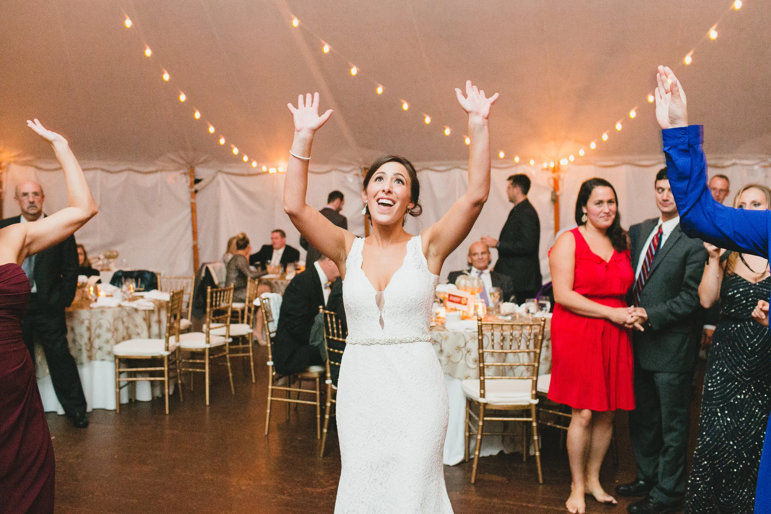 bride dancing with friends