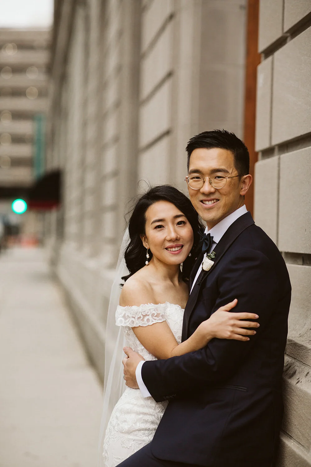 Groom Leaning Against the Wall 003.jpg