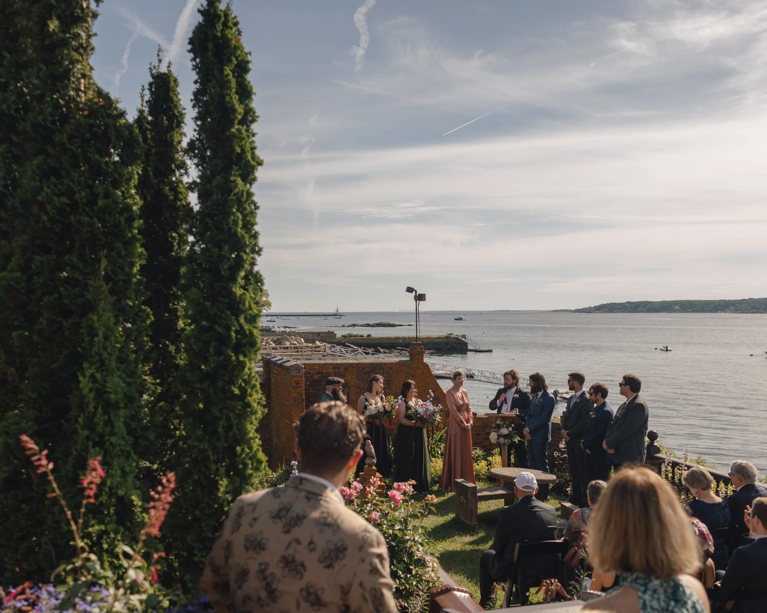 Wedding photographer in Boston captures oceanfront ceremony at Beauport, the Sleeper-McCann House.