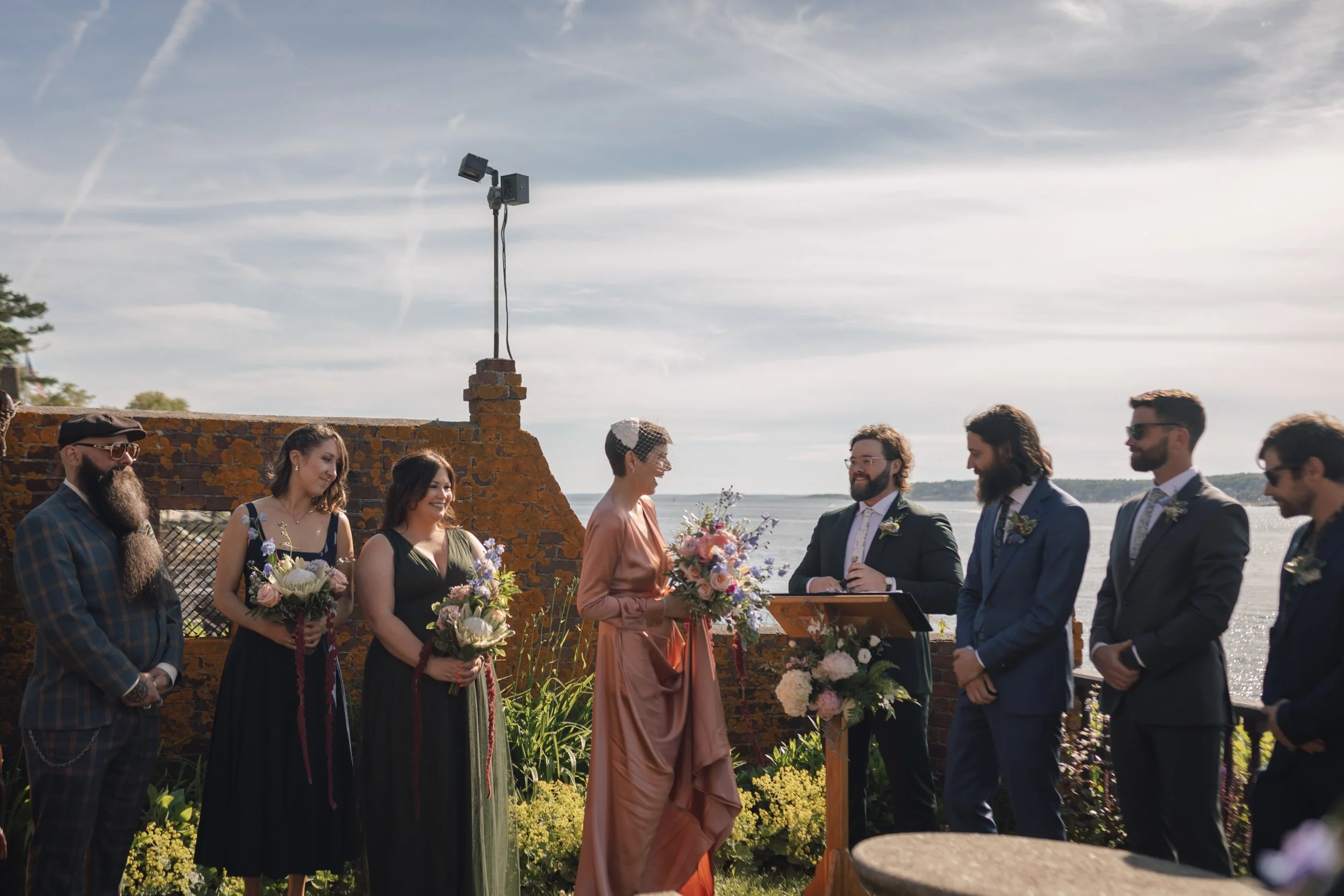 World's best wedding documentary photographer captures bride laughing during vows at Beauport, the Sleeper-McCann House.