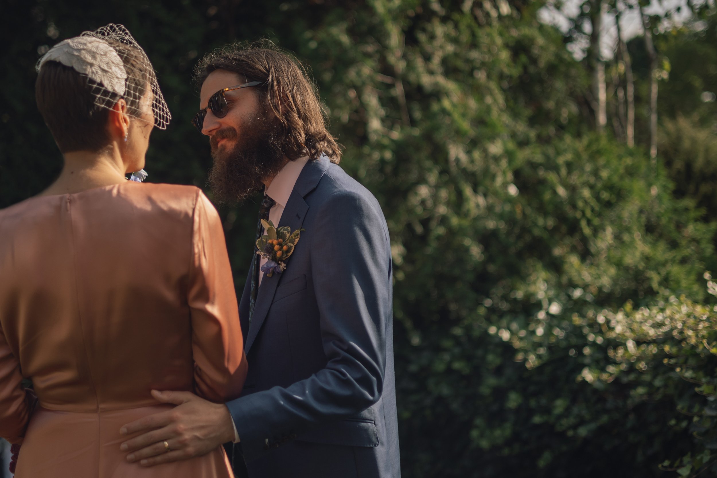 Wedding photographer in Boston, MA captures groom's smile after ceremony at Beauport, the Sleeper-McCann House.