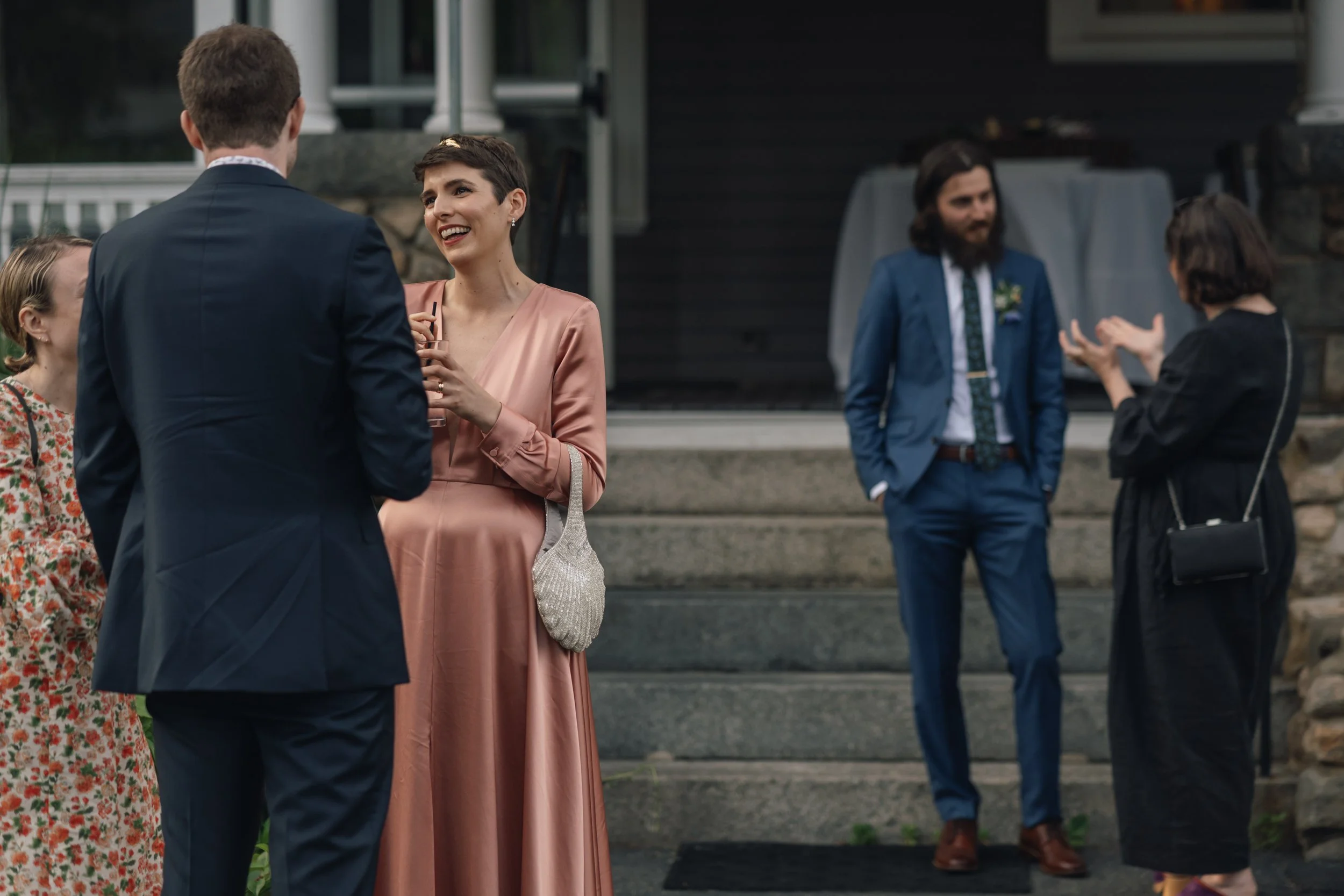 Fine art wedding photographer in Boston, MA captures bride laughing with cocktail at Beauport, the Sleeper-McCann House.