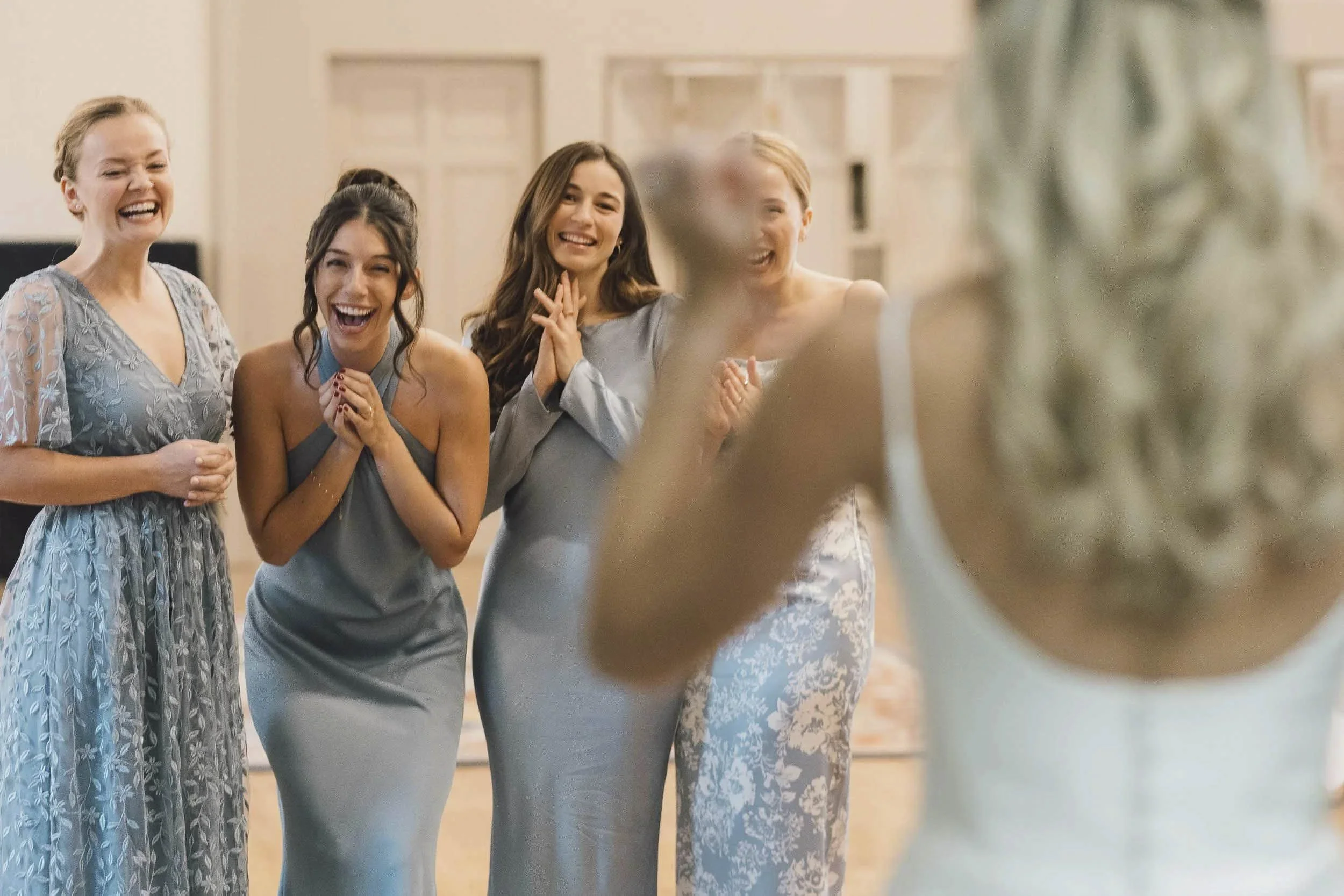 Bridesmaids reacting to first look — candid documentary wedding photography Sarasota