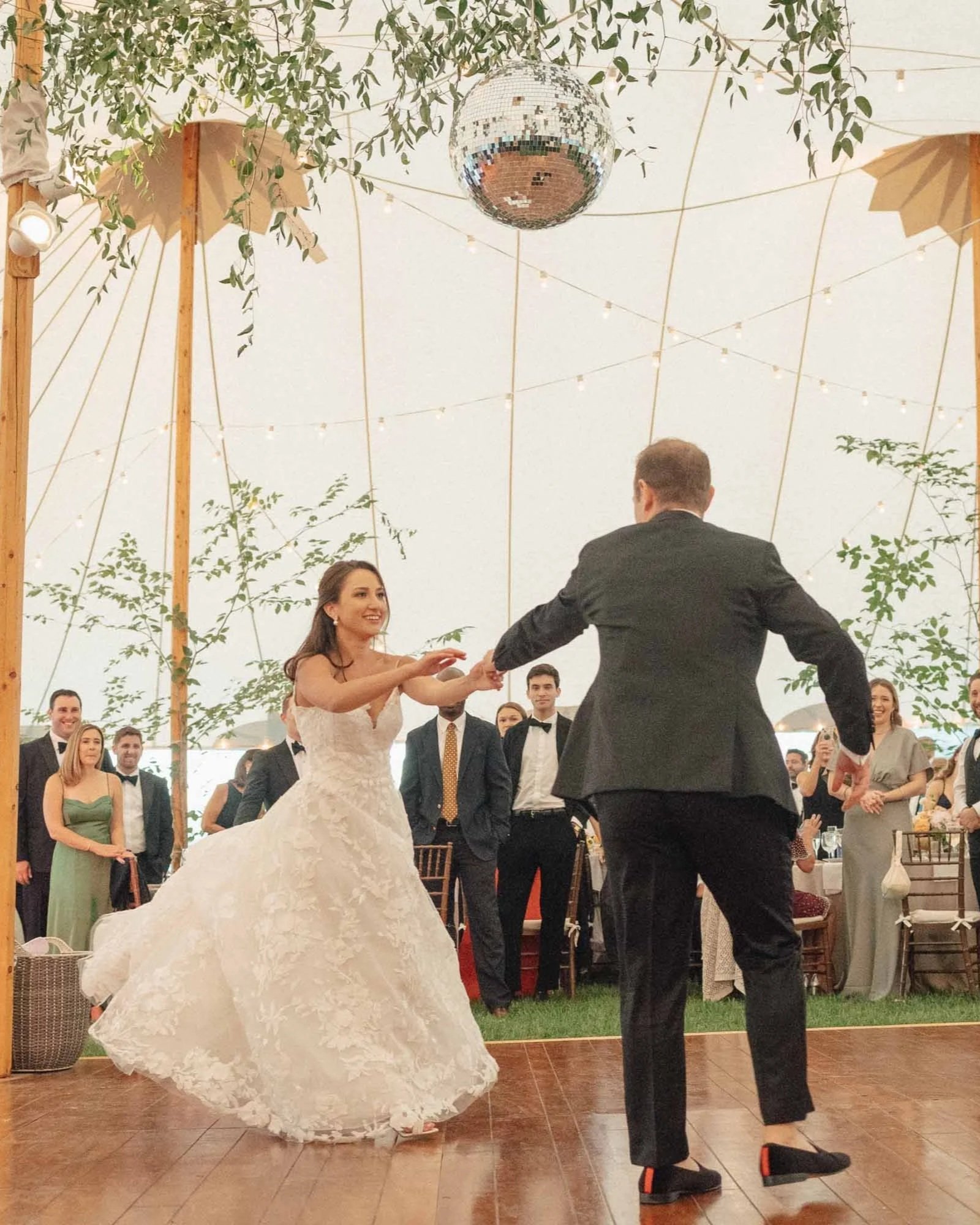bride and grooms first dance in a tent wedding in sarasota Florida.
