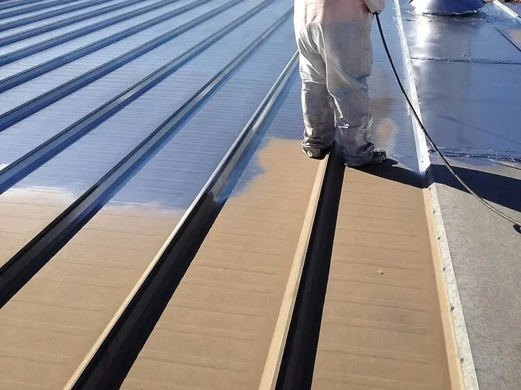 Metal roof coating, mid-job