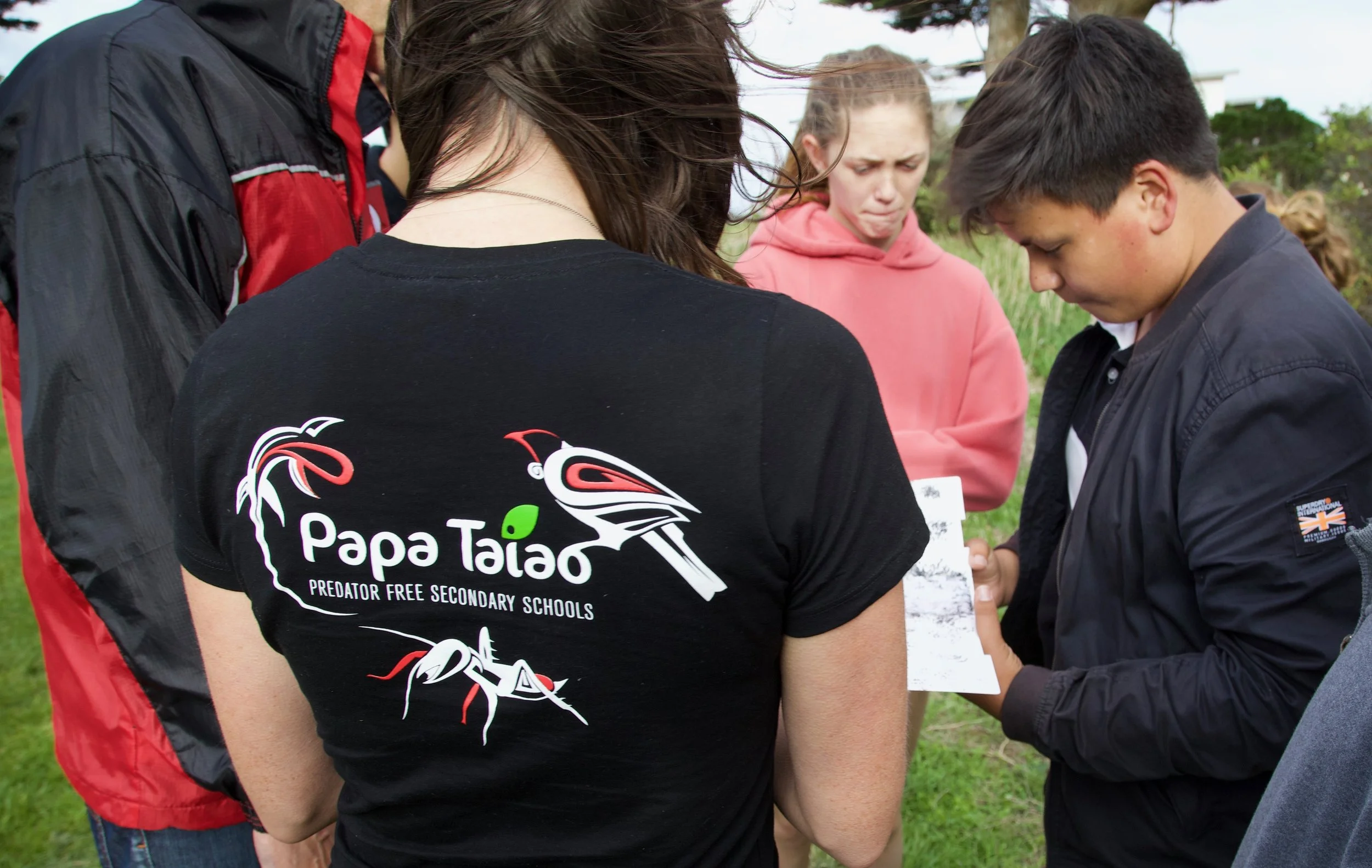Newlands College students monitoring their grounds to identify which predator species are present.