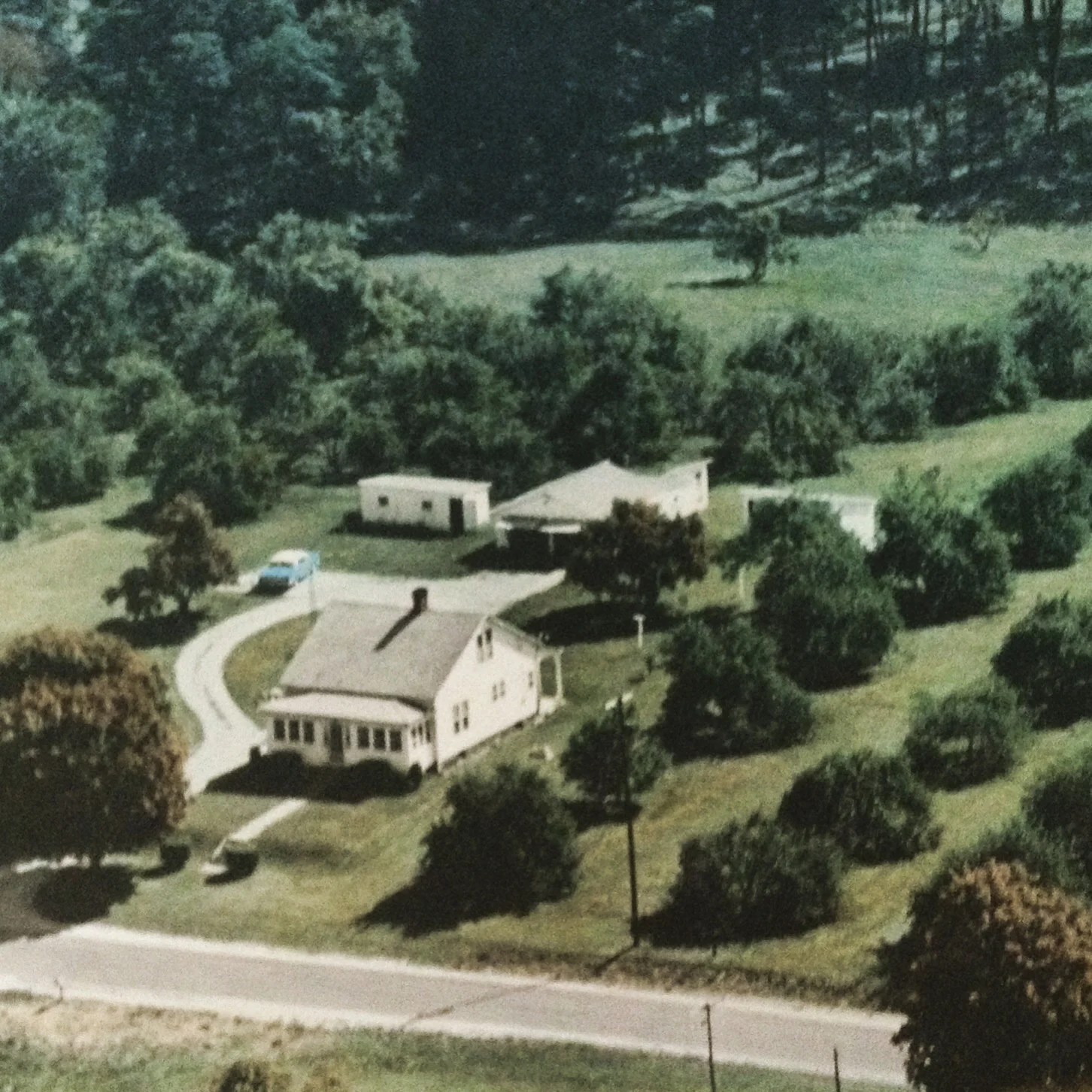 Harnetty's grandparent's home and apple orchard, Junction City, Ohio. They referred to the cemetery across the street as "Silent City."