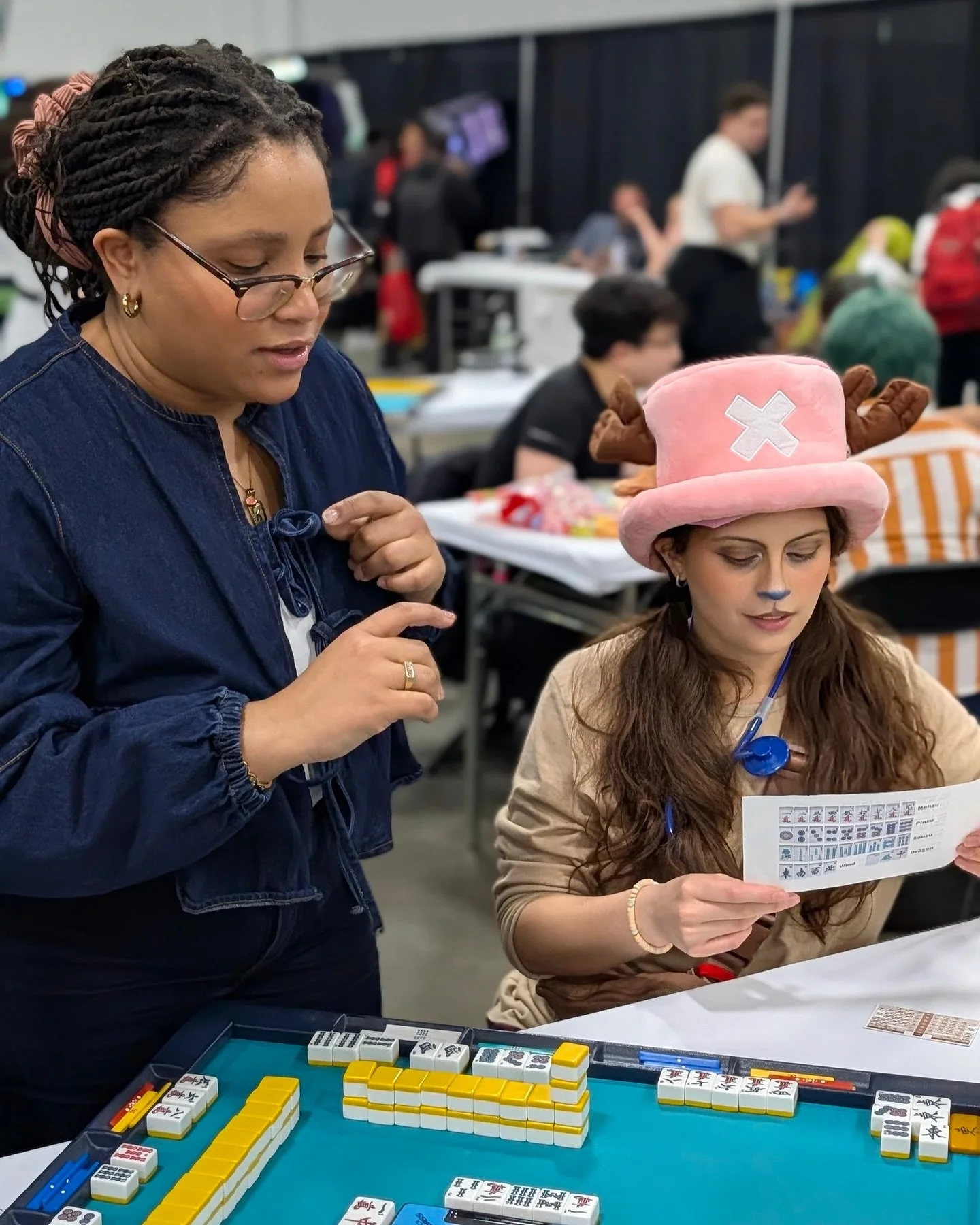 The crew at @nycriichinomi spent their weekend at the Castle Point Anime convention, sharing the love of mahjong! Conventions are a great way to connect with a new crowd of players!