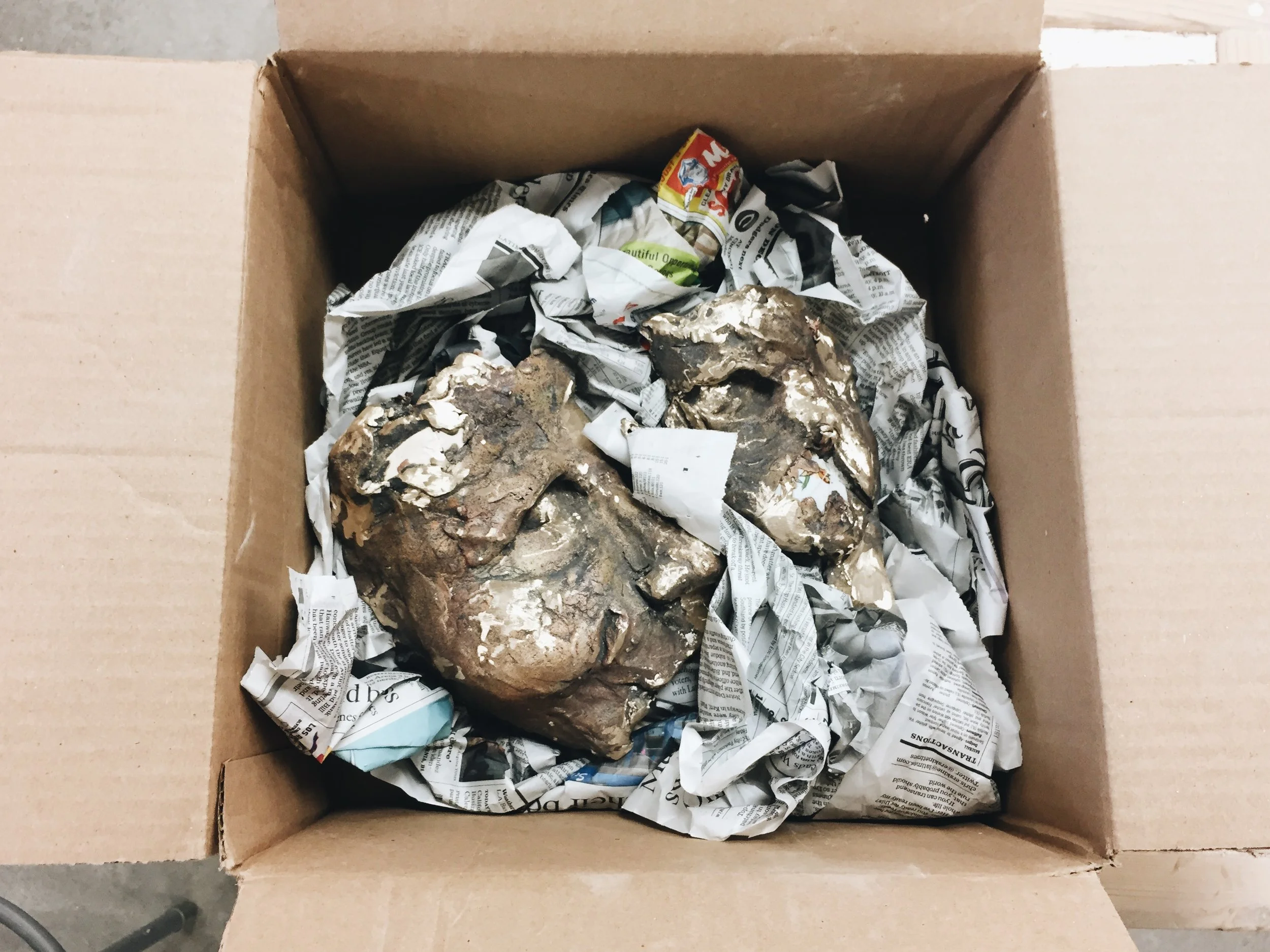 bronze face sculpture