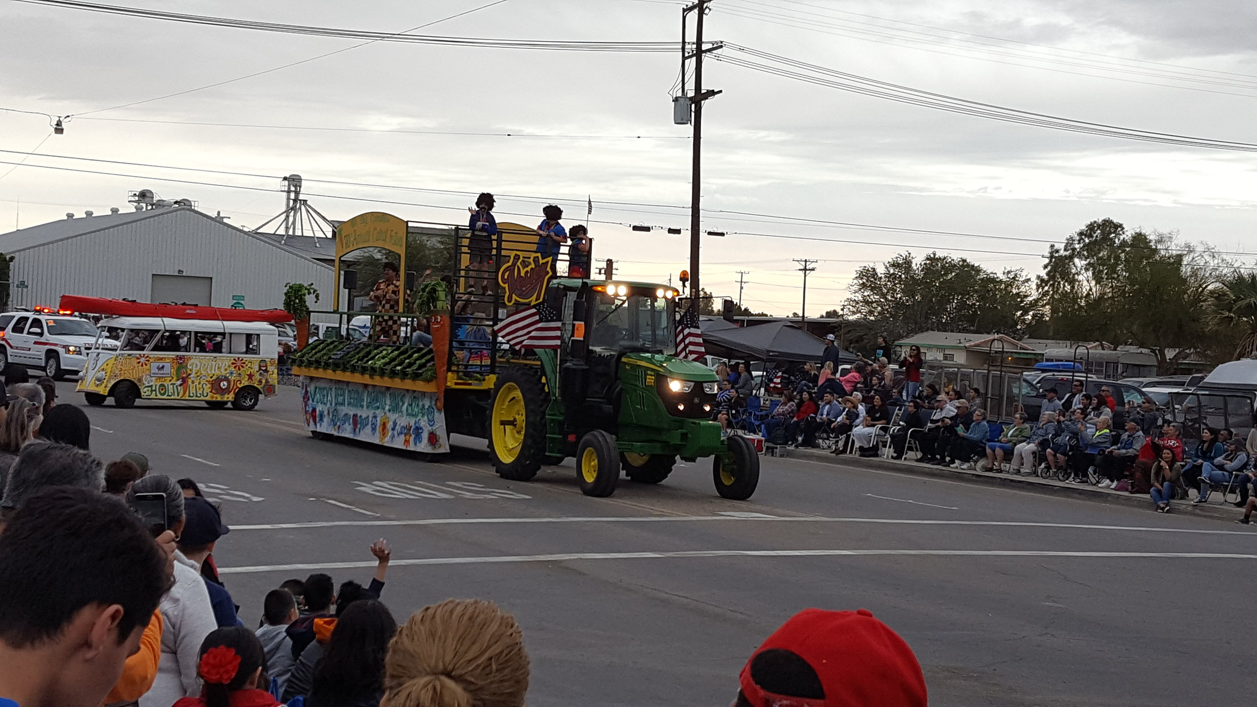 The float, with its 70's theme also included fresh produce!